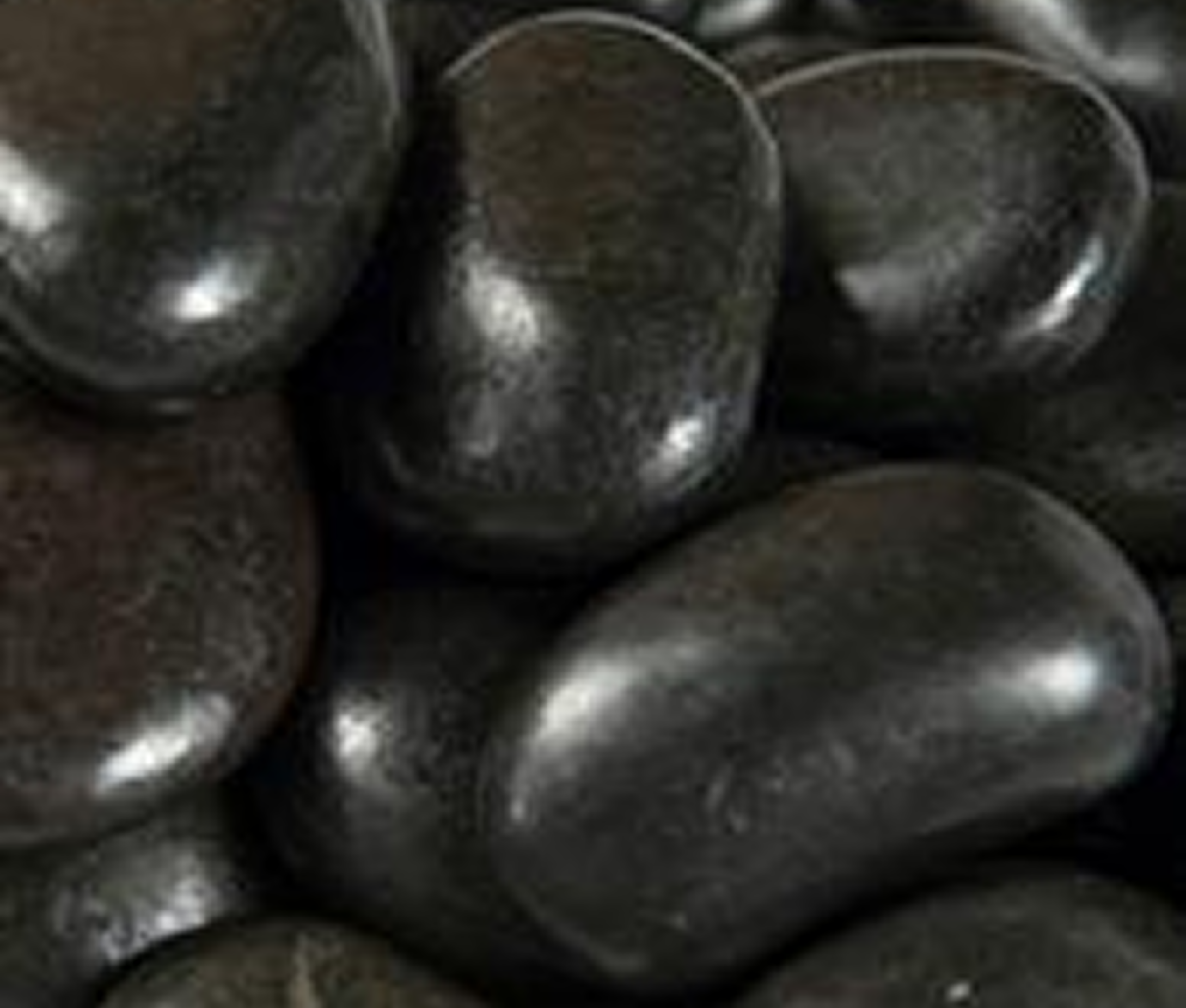 Glossy dark candy pieces