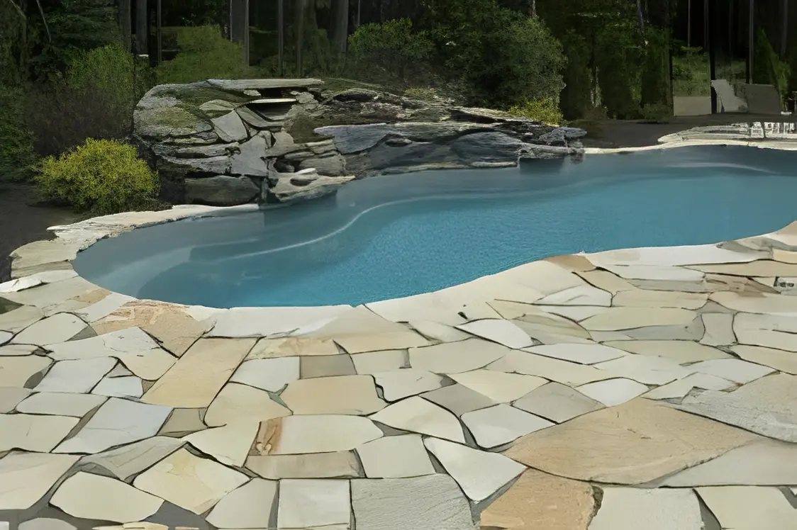 Relaxing garden pool with stone surround