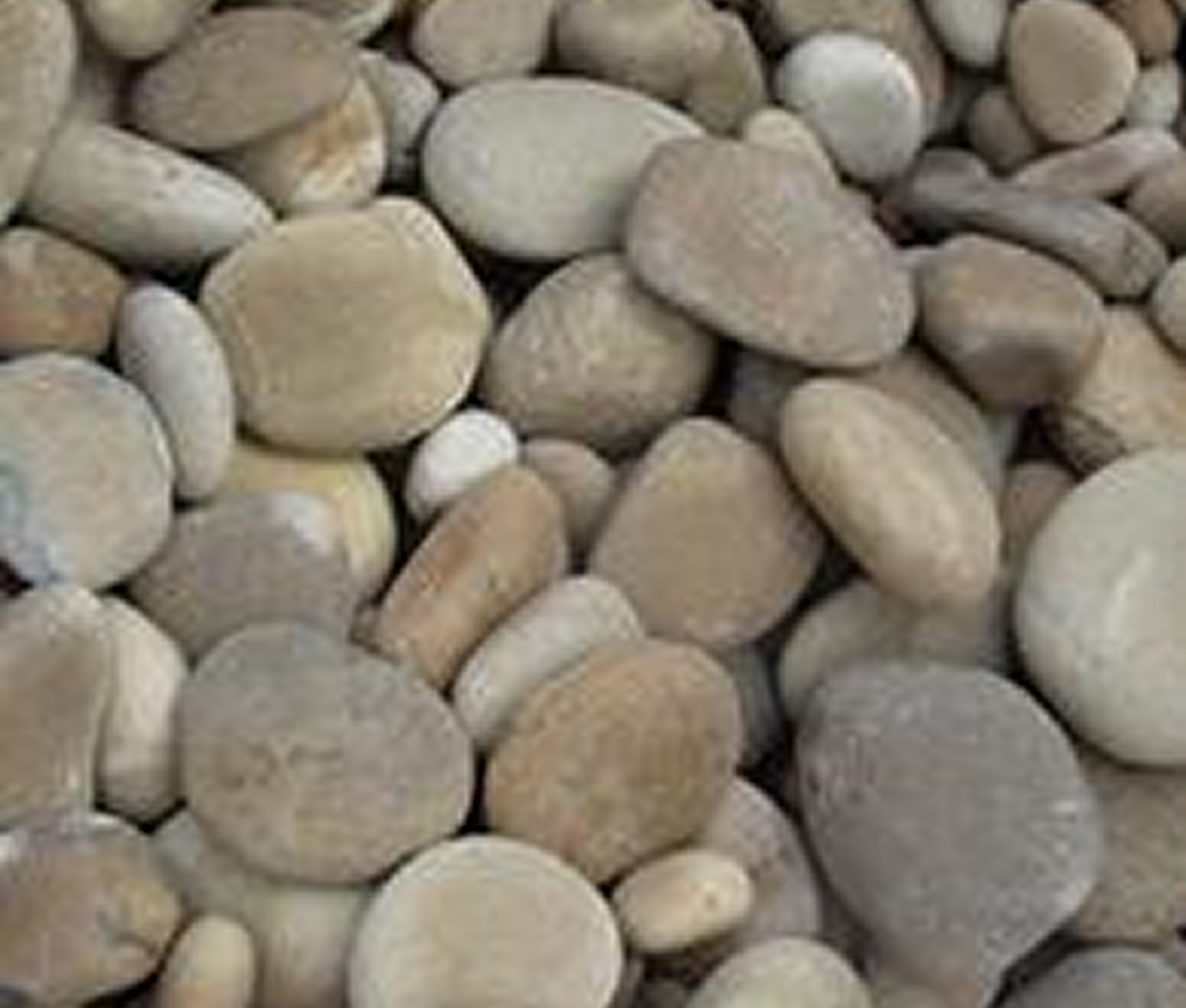 Smooth river stones in various shades