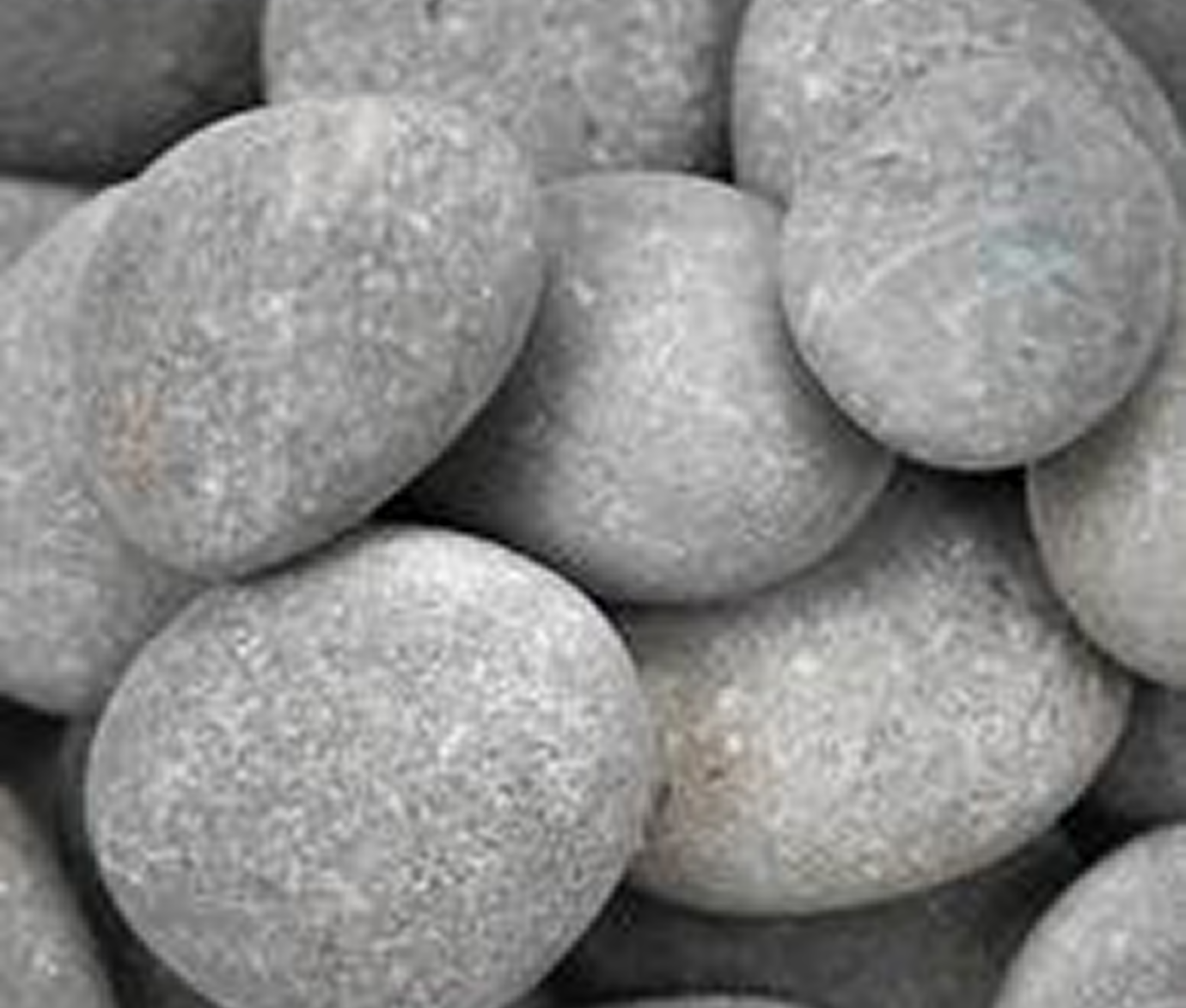 Smooth gray pebbles close-up