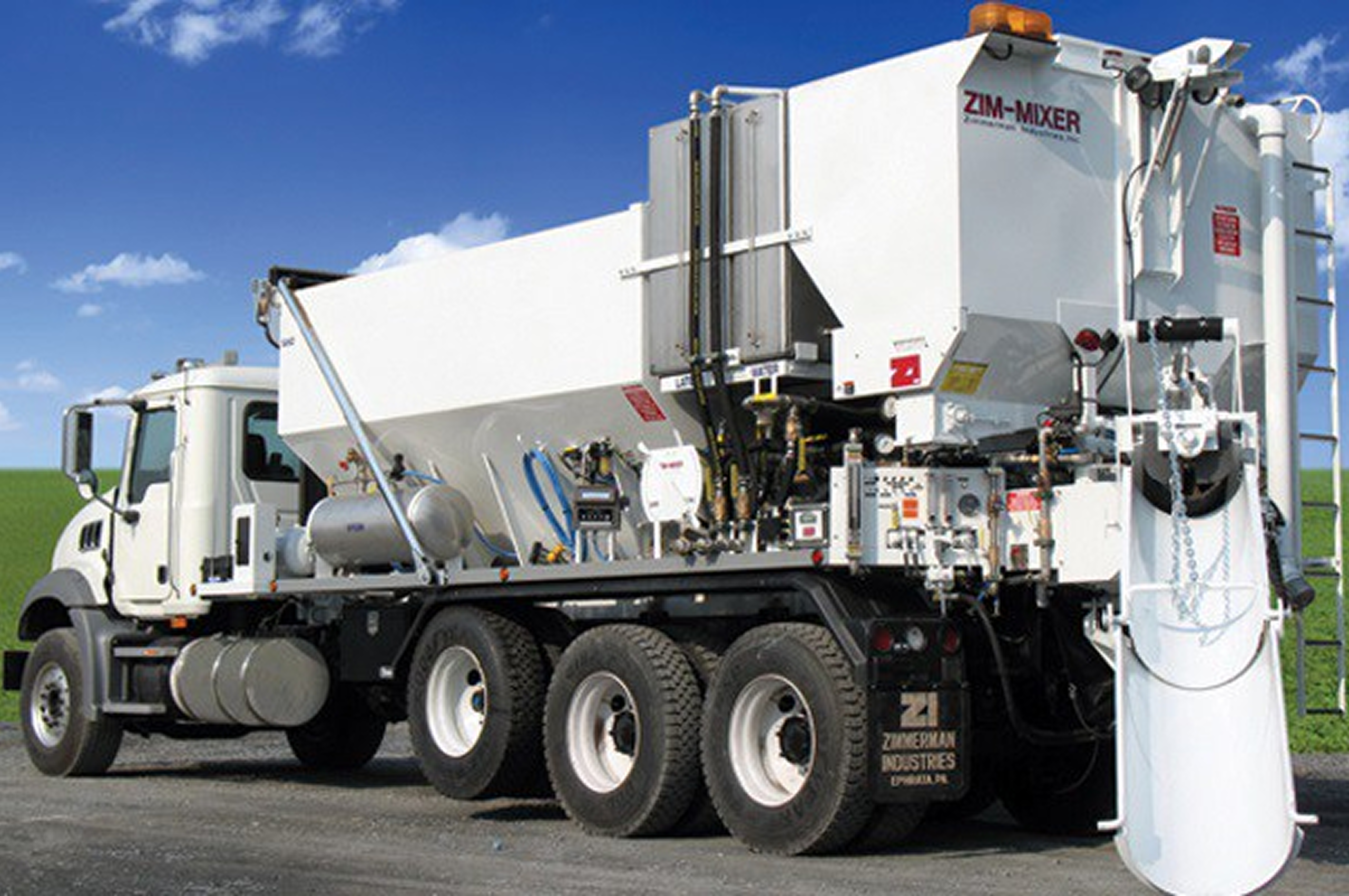 Large cement mixer vehicle parked