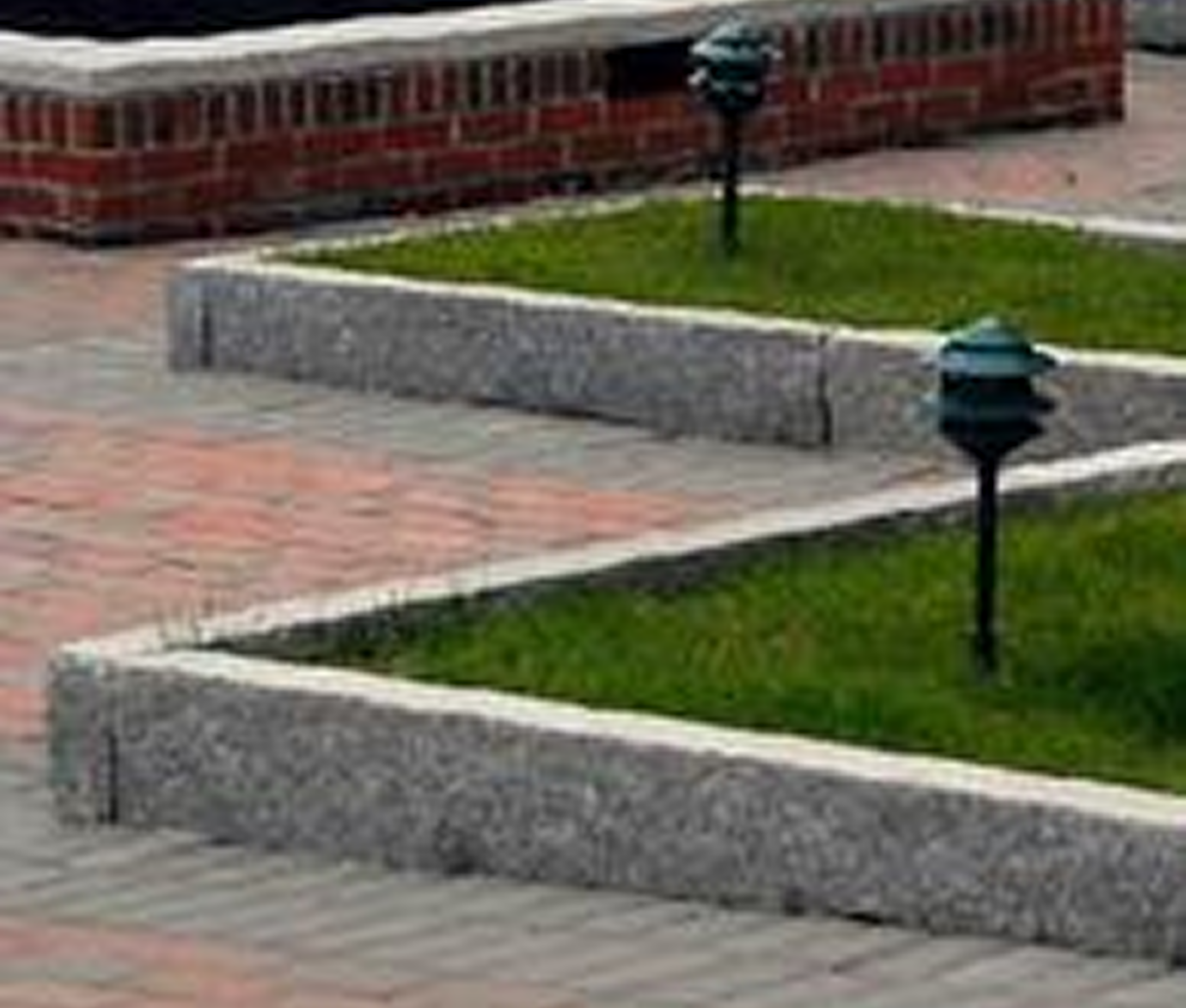 Brick path with grass and lights