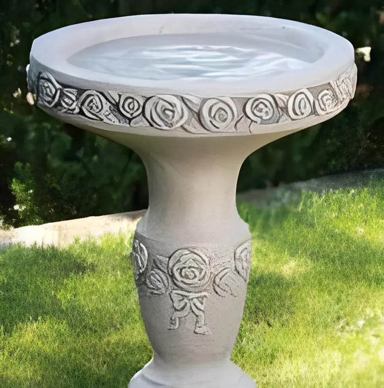 Elegant garden bird bath with water
