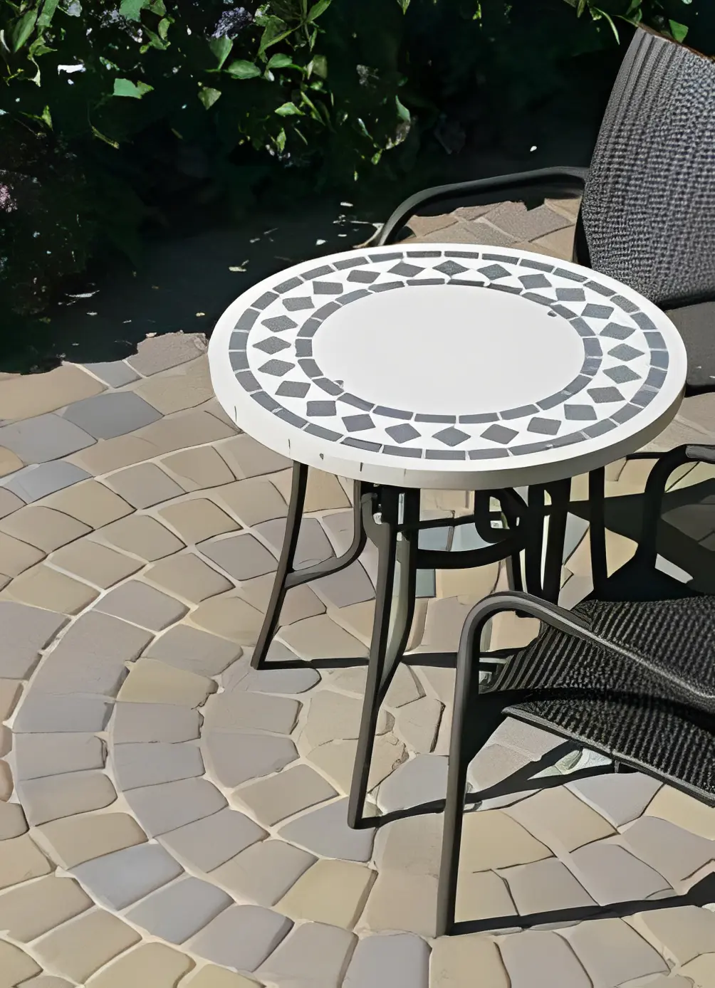 Wicker chairs and tiled patio table