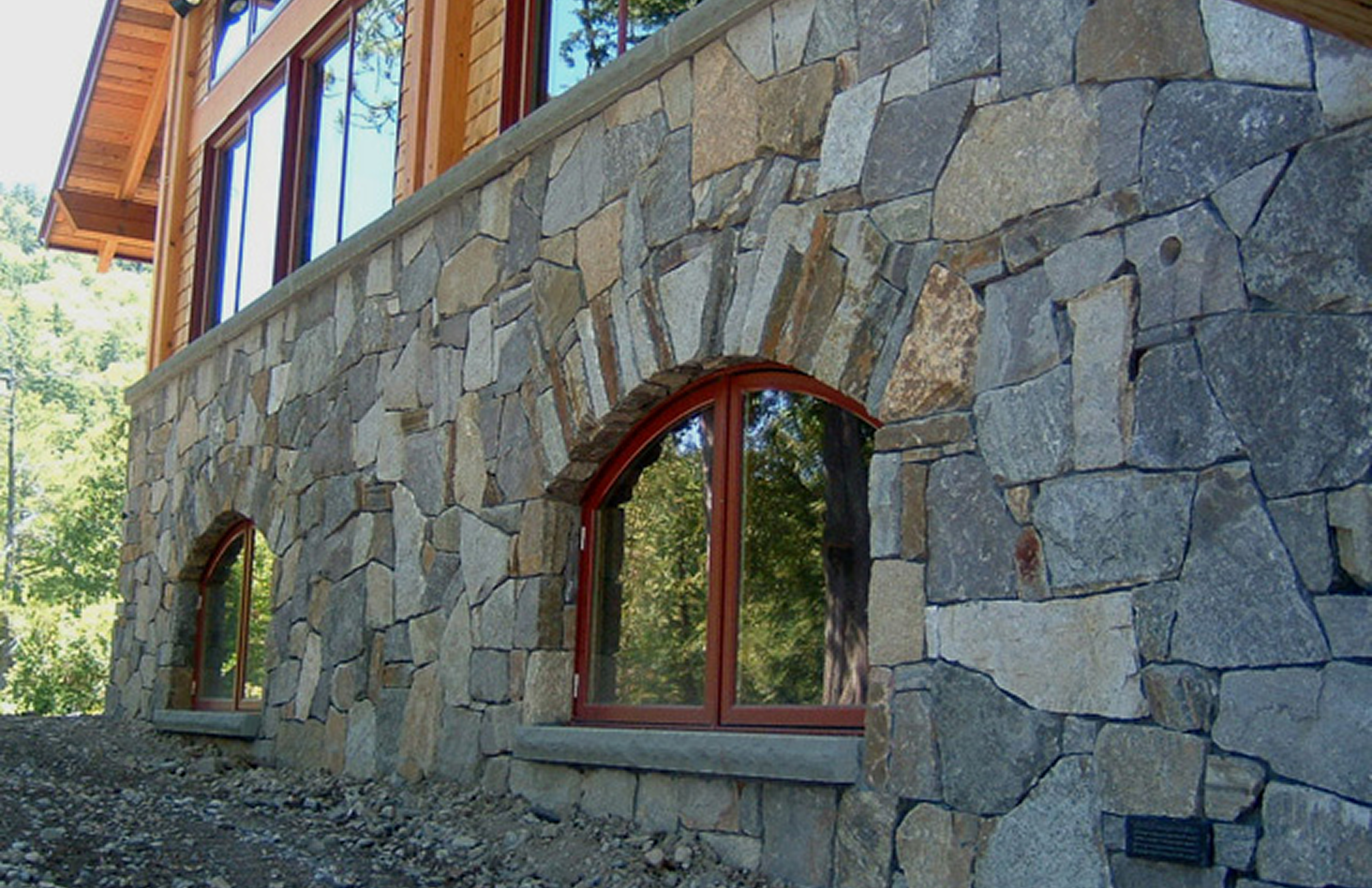 House exterior featuring stone and wood elements