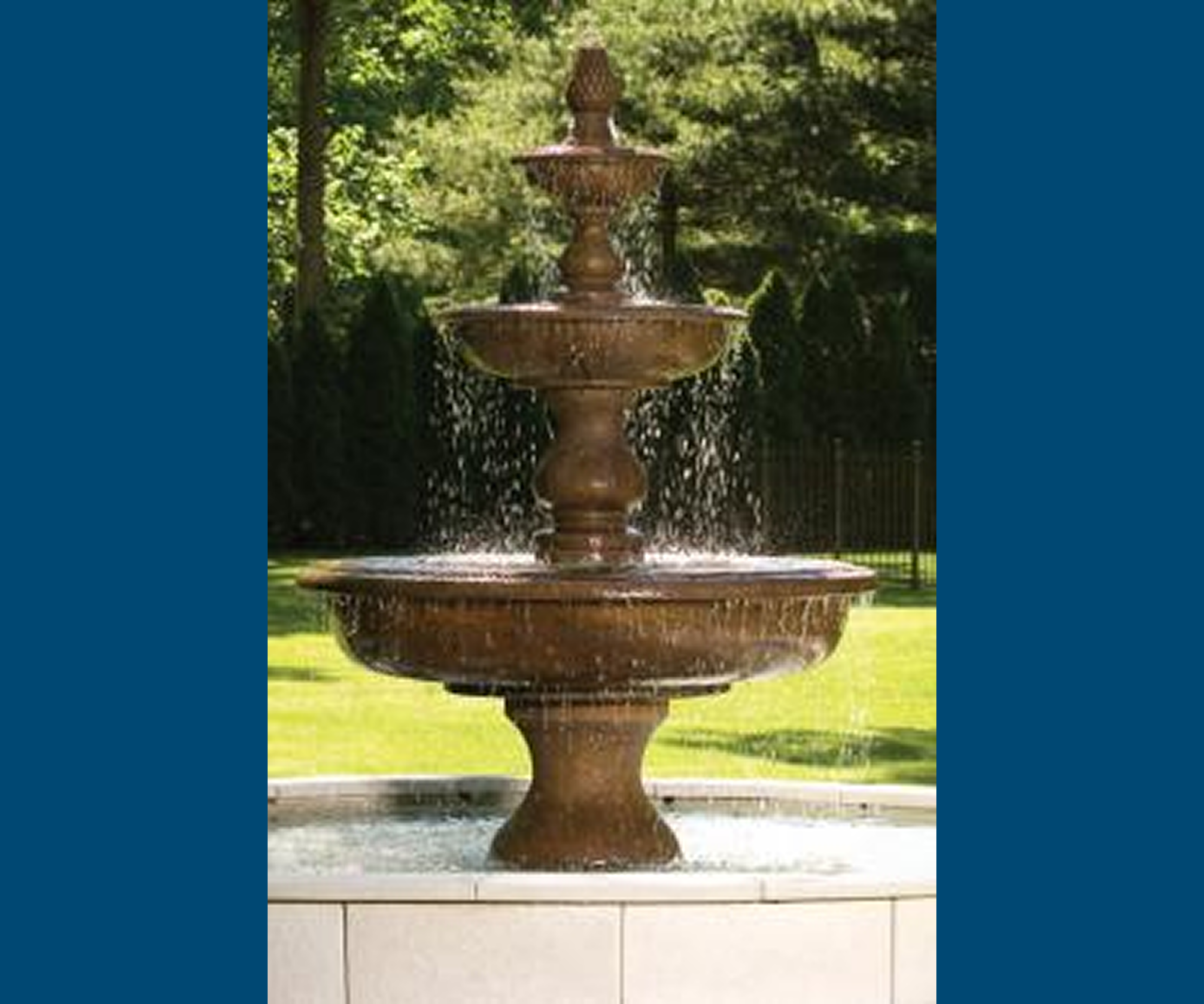 Three-tiered garden fountain with water cascading