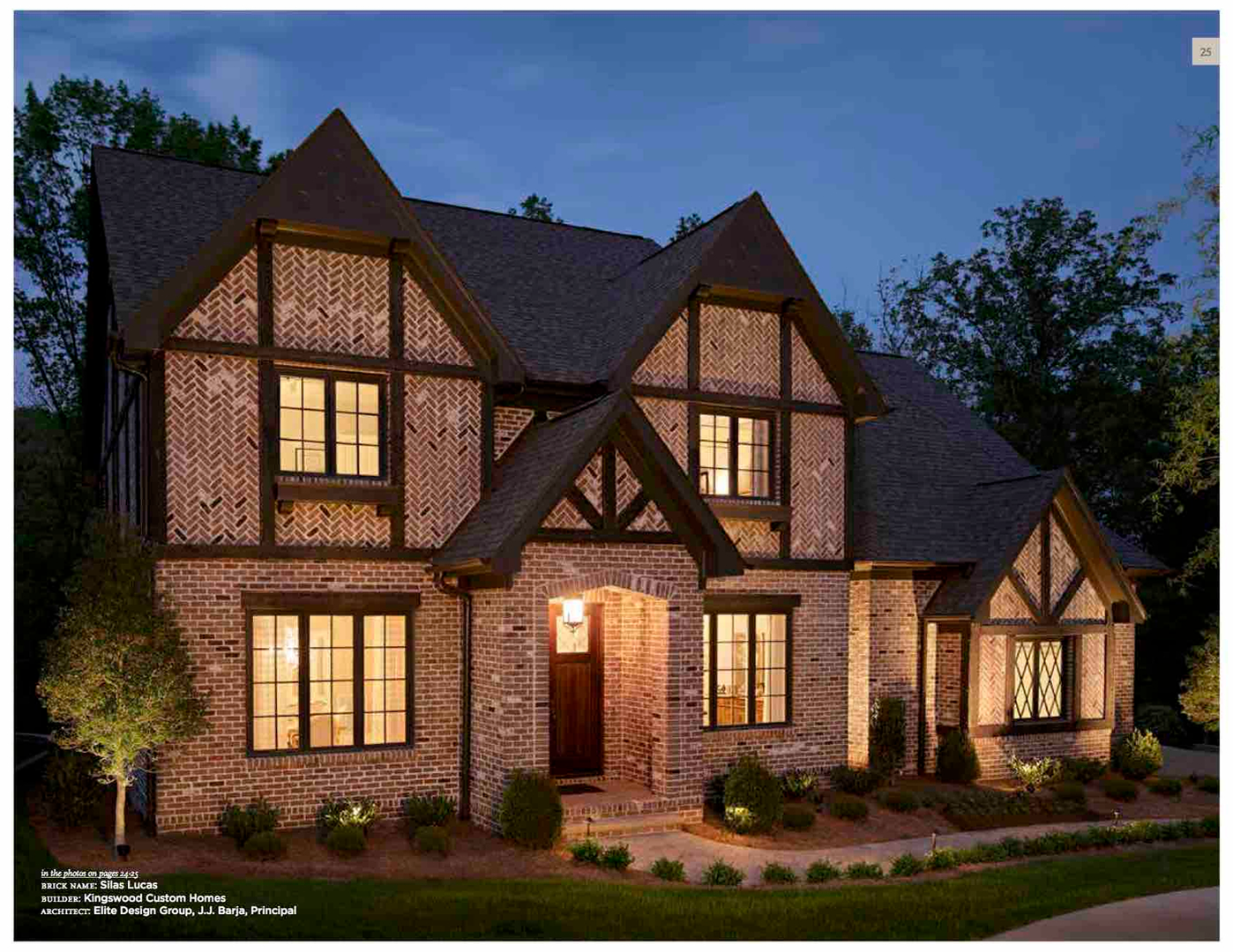 Elegant brick facade with warm window lights.