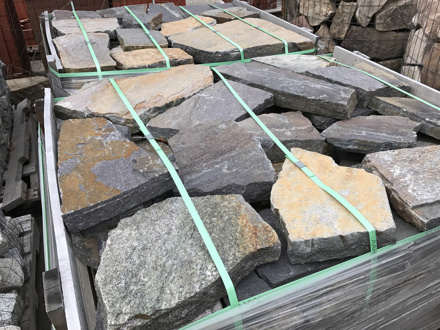 Stacked stone slabs on wooden pallet