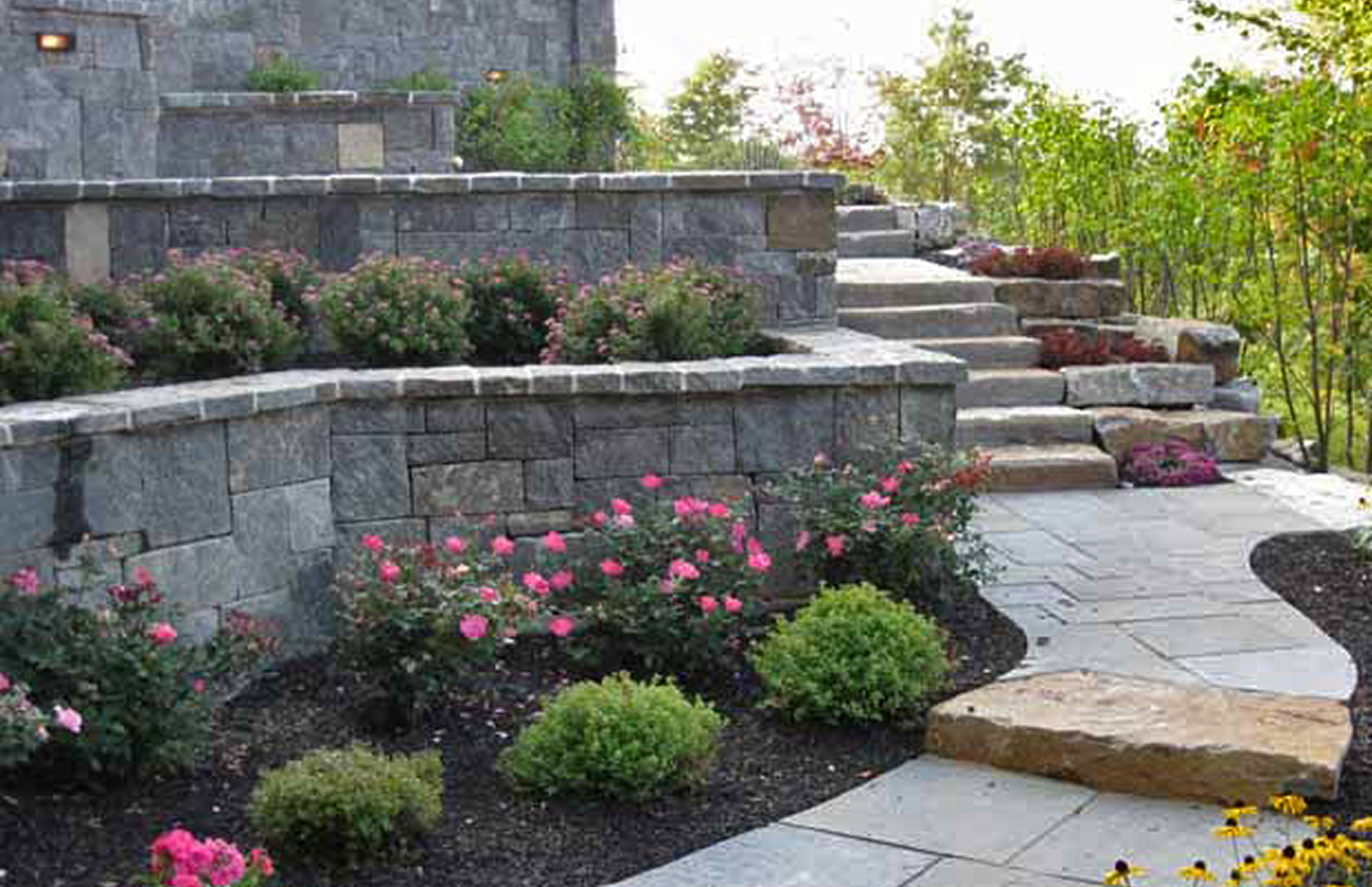 Stone terraced garden with blooming flowers