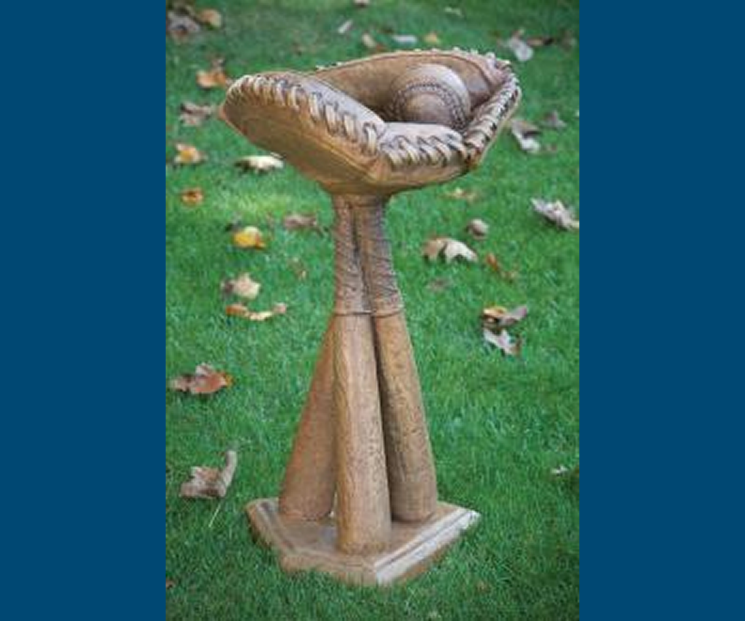 Decorative baseball glove birdbath outdoors