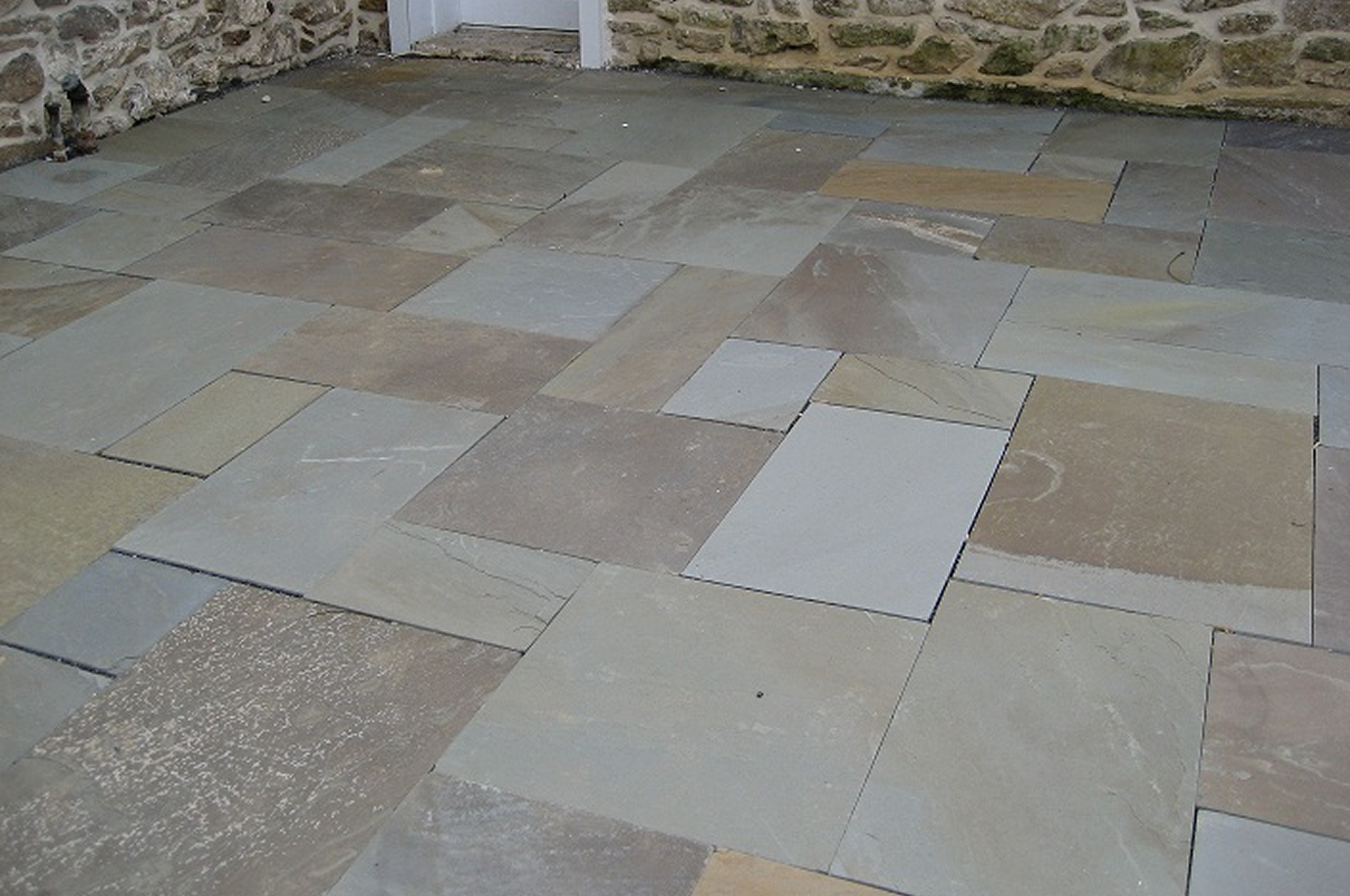 Gray stone tiles on outdoor patio