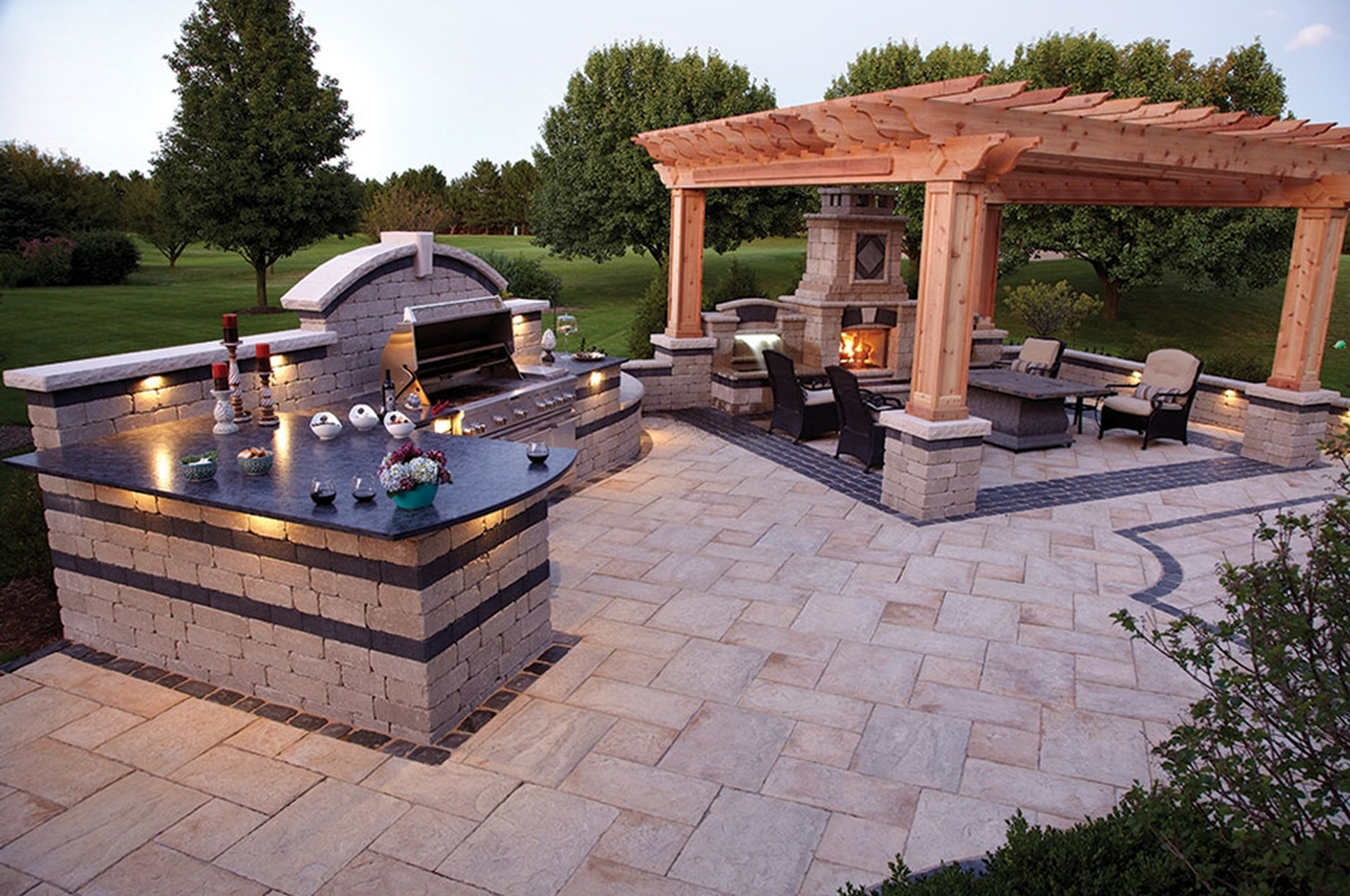 Outdoor patio with pergola and kitchen