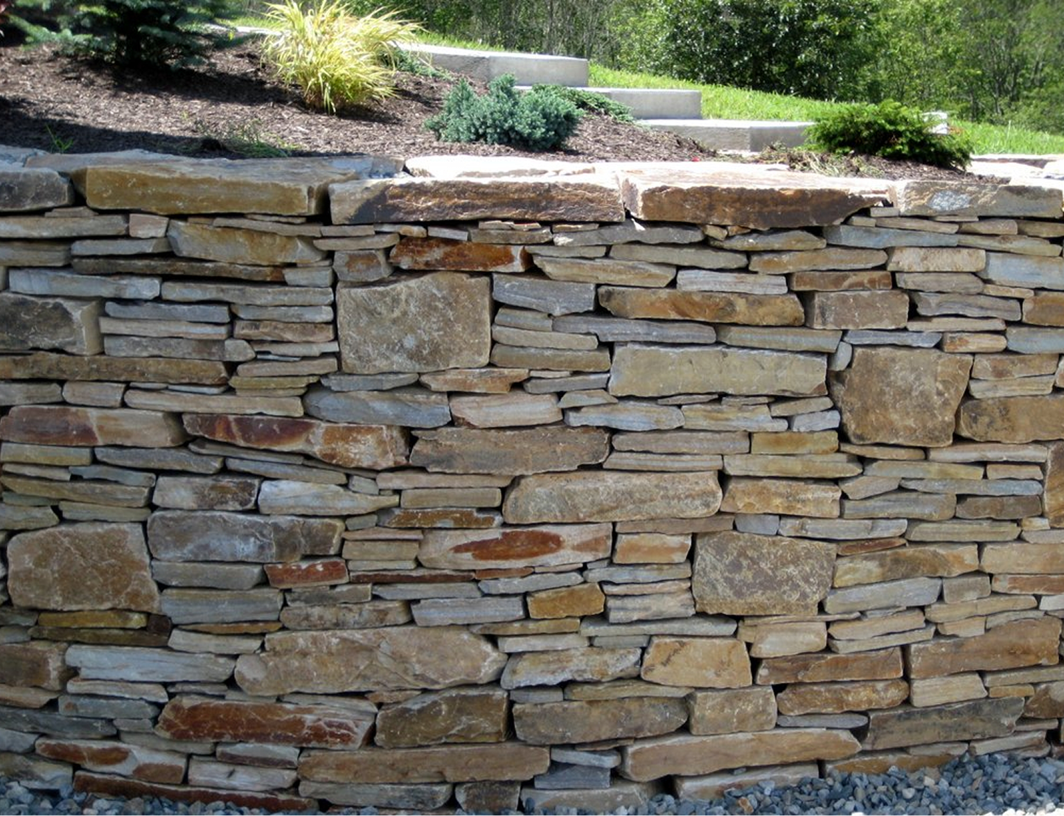 Layered stone wall in garden