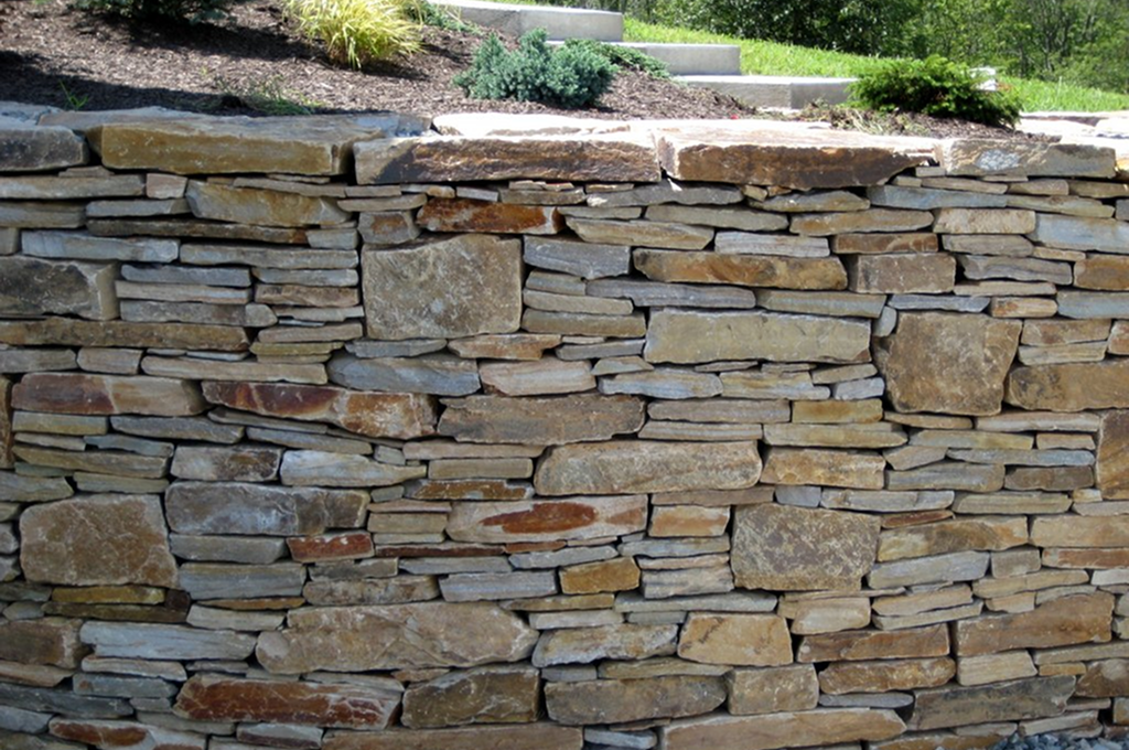 Stone wall with stacked rocks