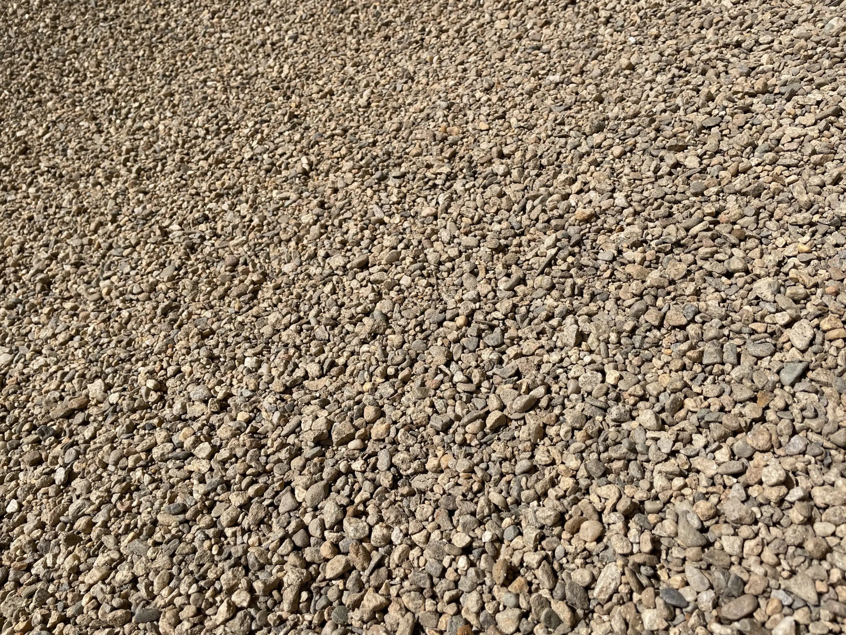 Gravel stones scattered on the ground