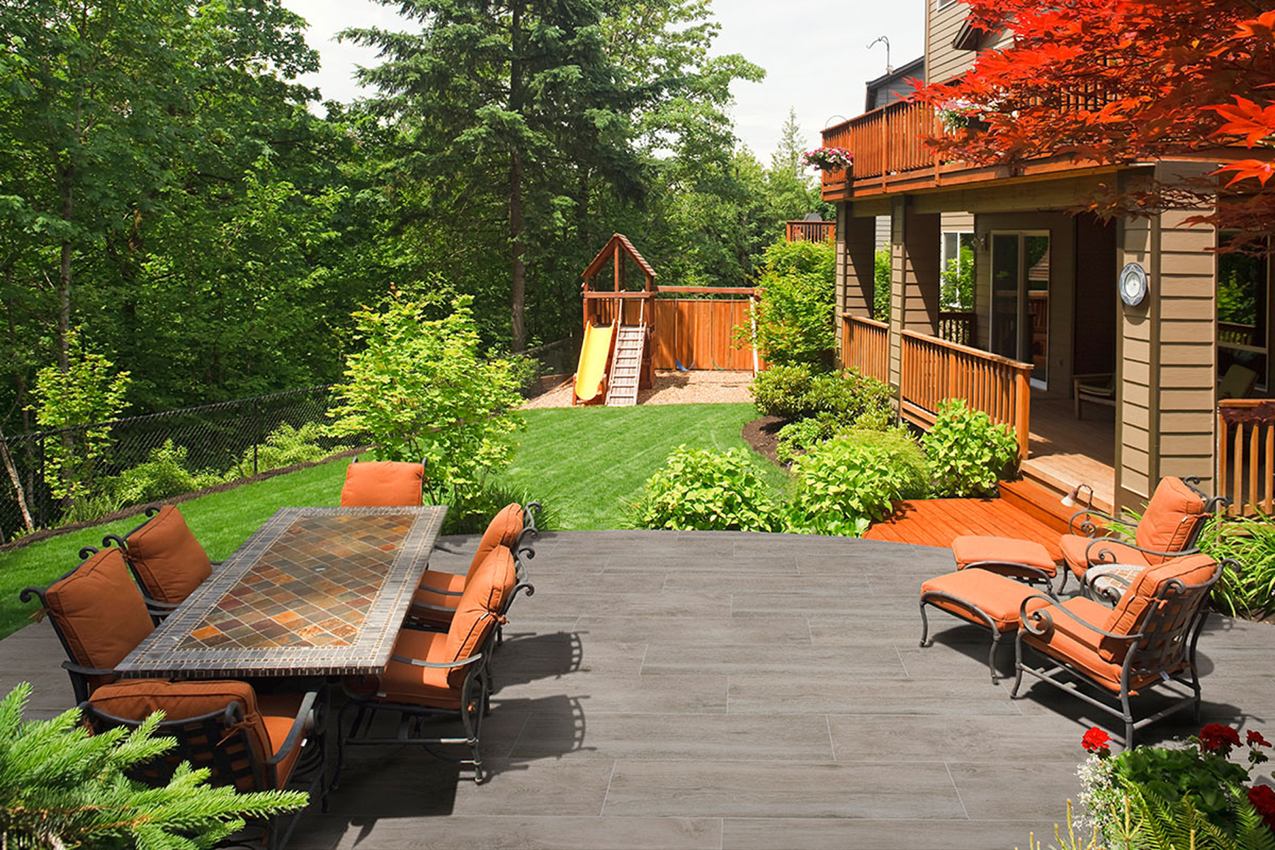 Wooden deck overlooking lush garden