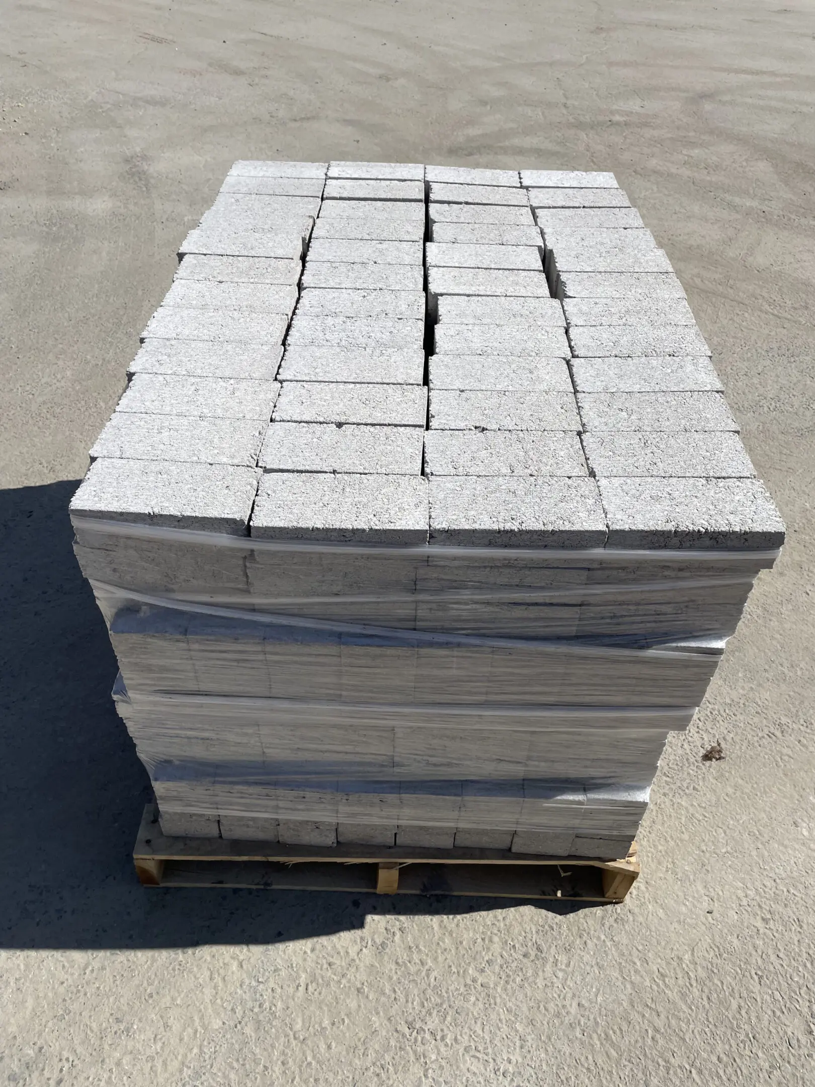 Stacked bricks on a wooden pallet
