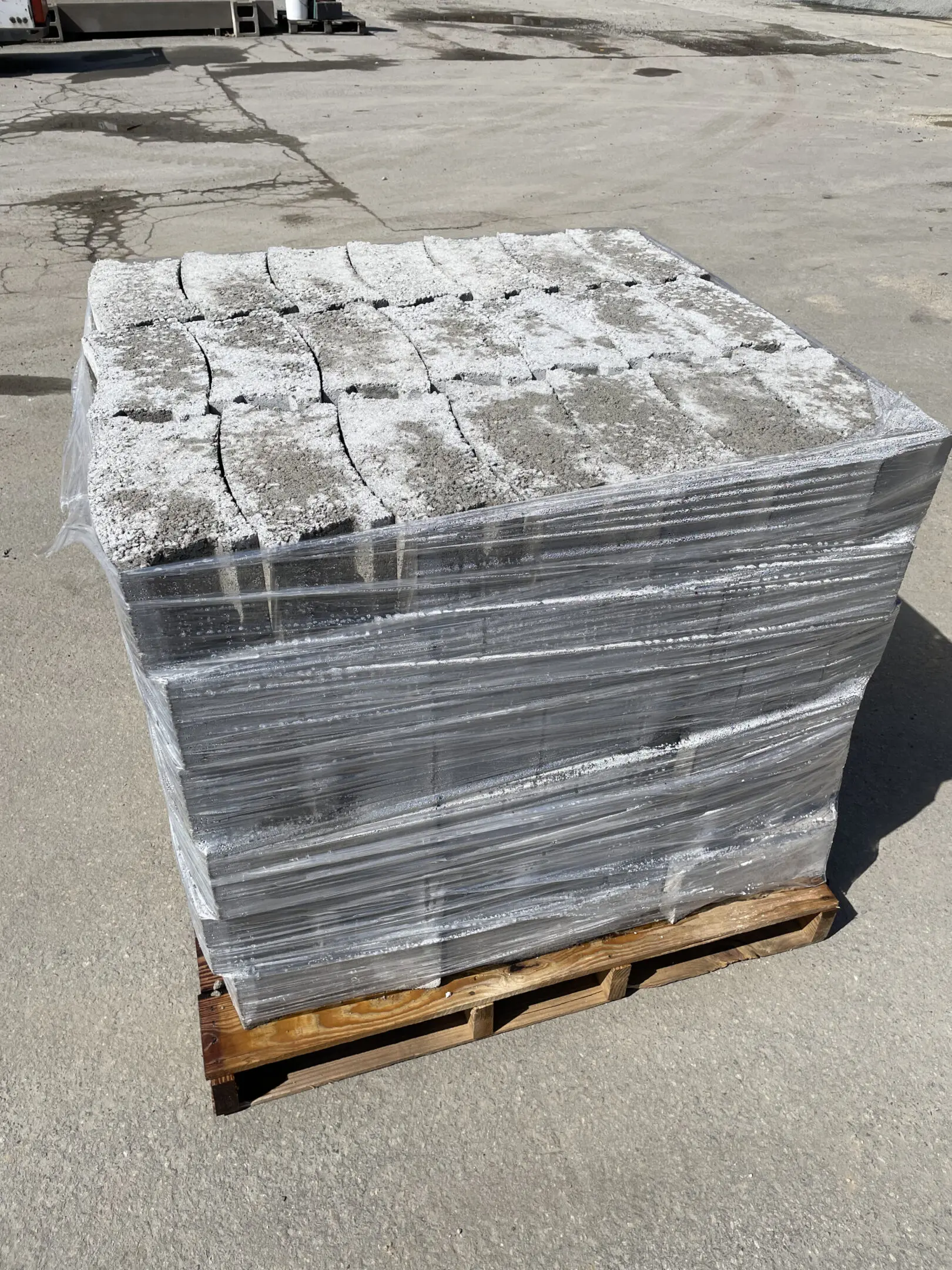 Pallet of wrapped concrete blocks