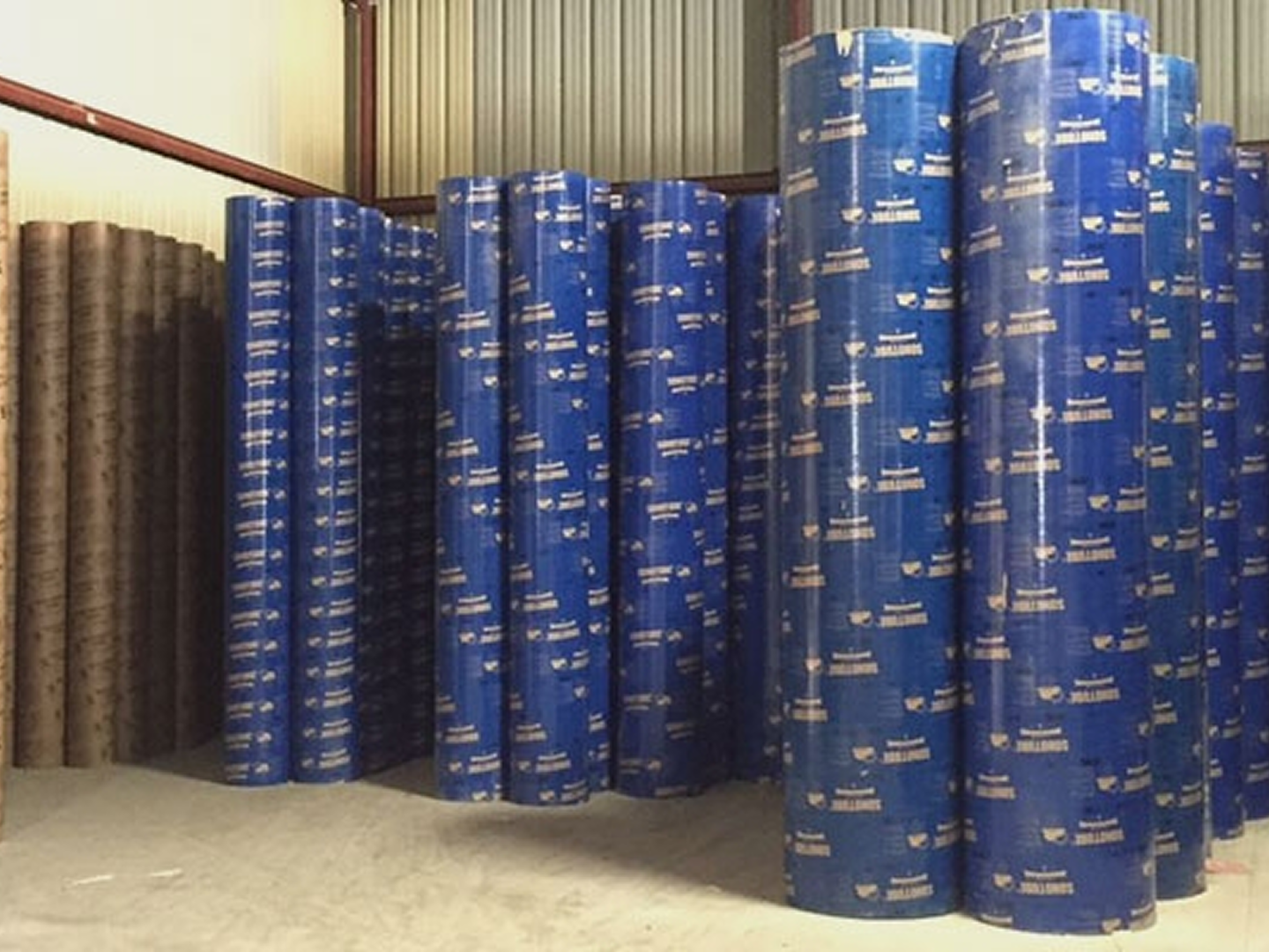 Large rolls of blue industrial paper