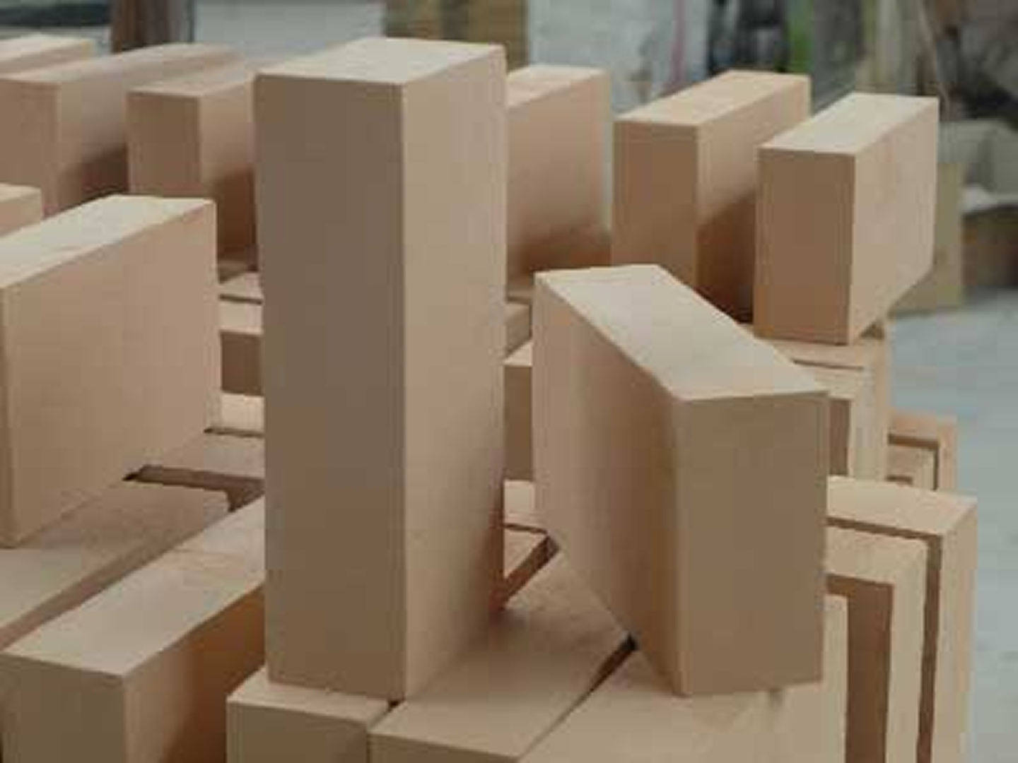 Beige bricks piled for construction