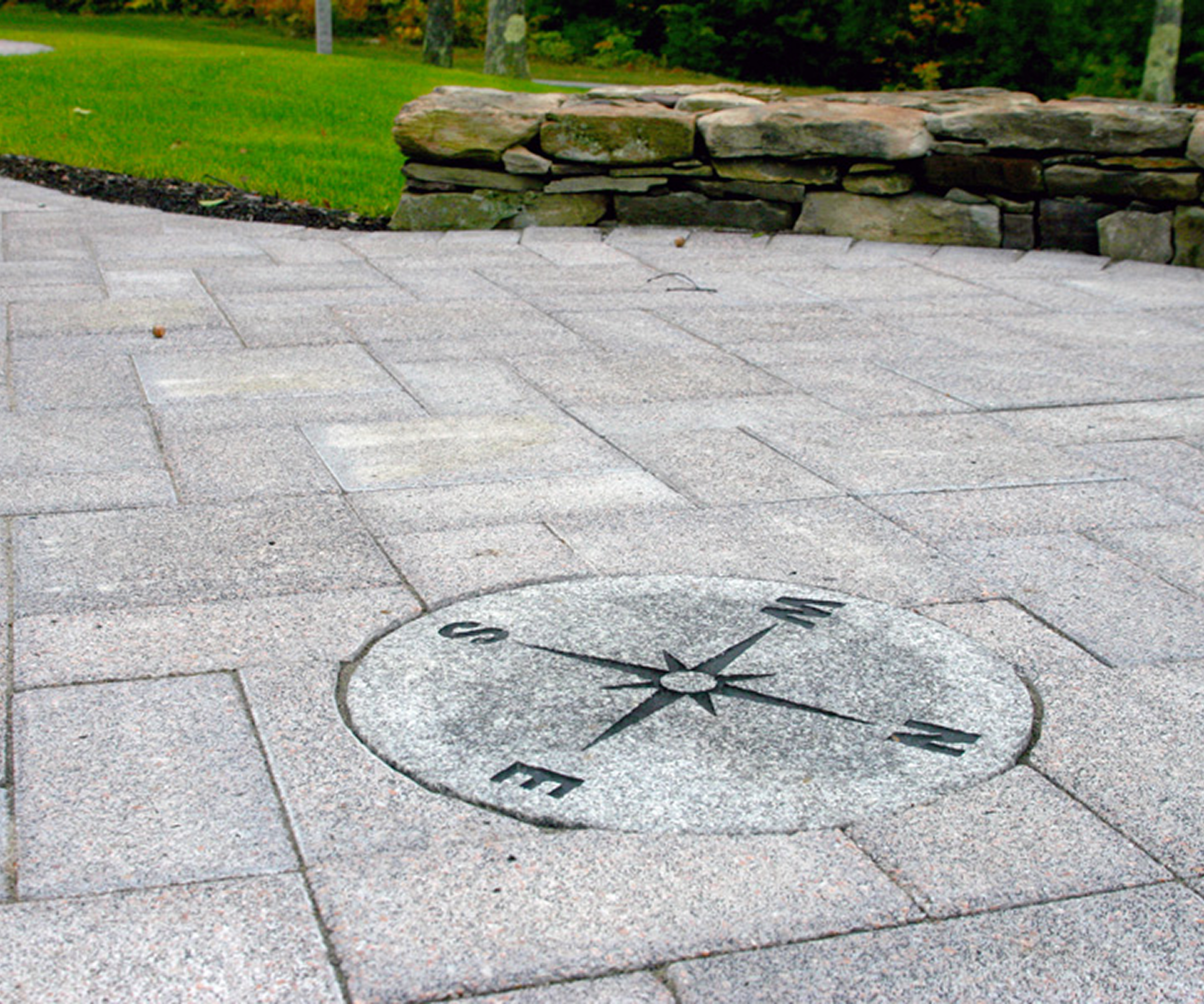 Compass rose on stone pavement