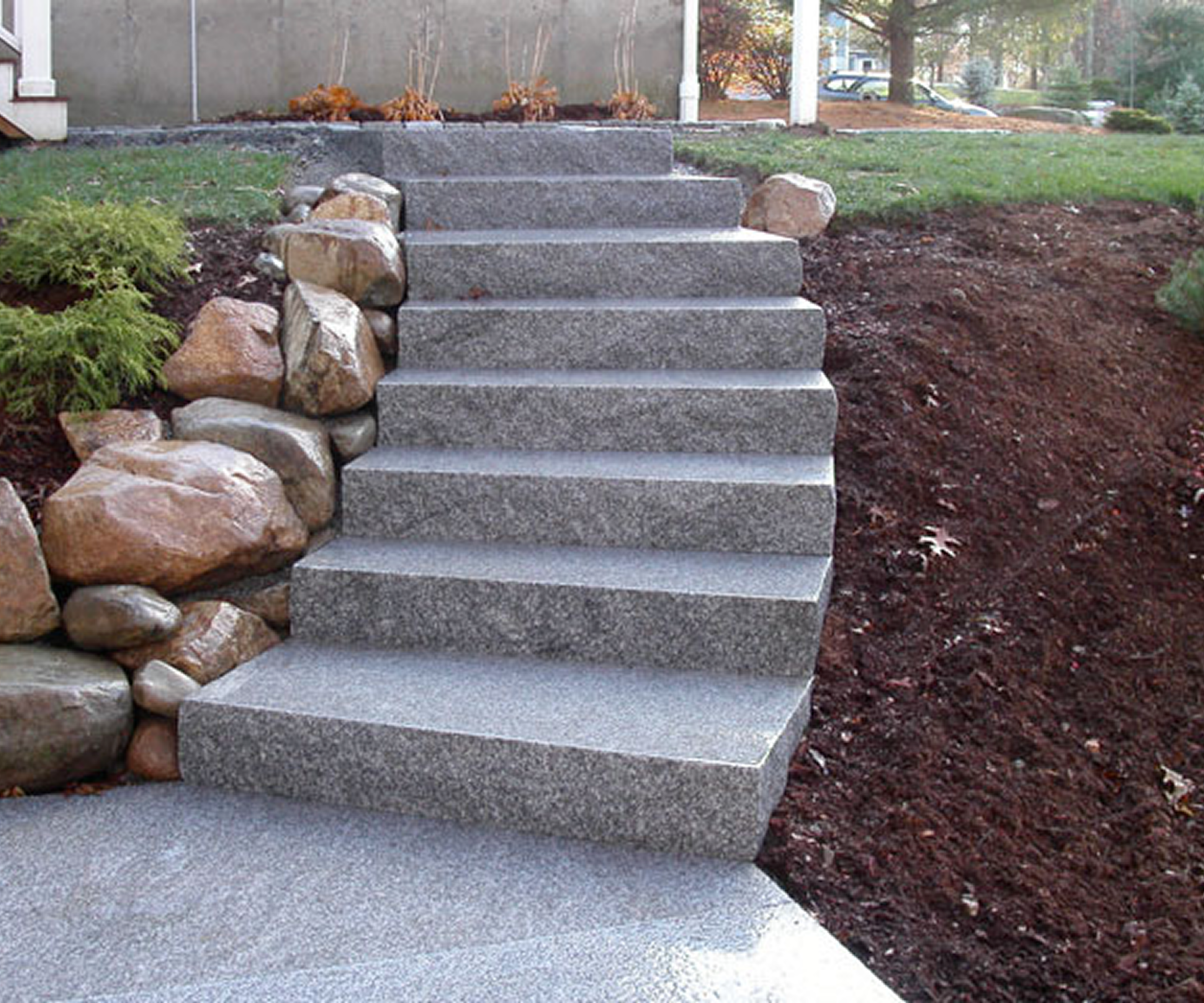 Gray stone steps with surrounding rocks