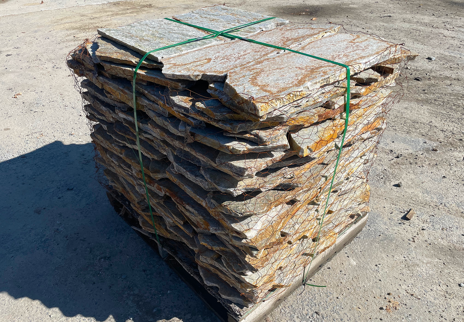Stacked stone slabs on wooden pallet