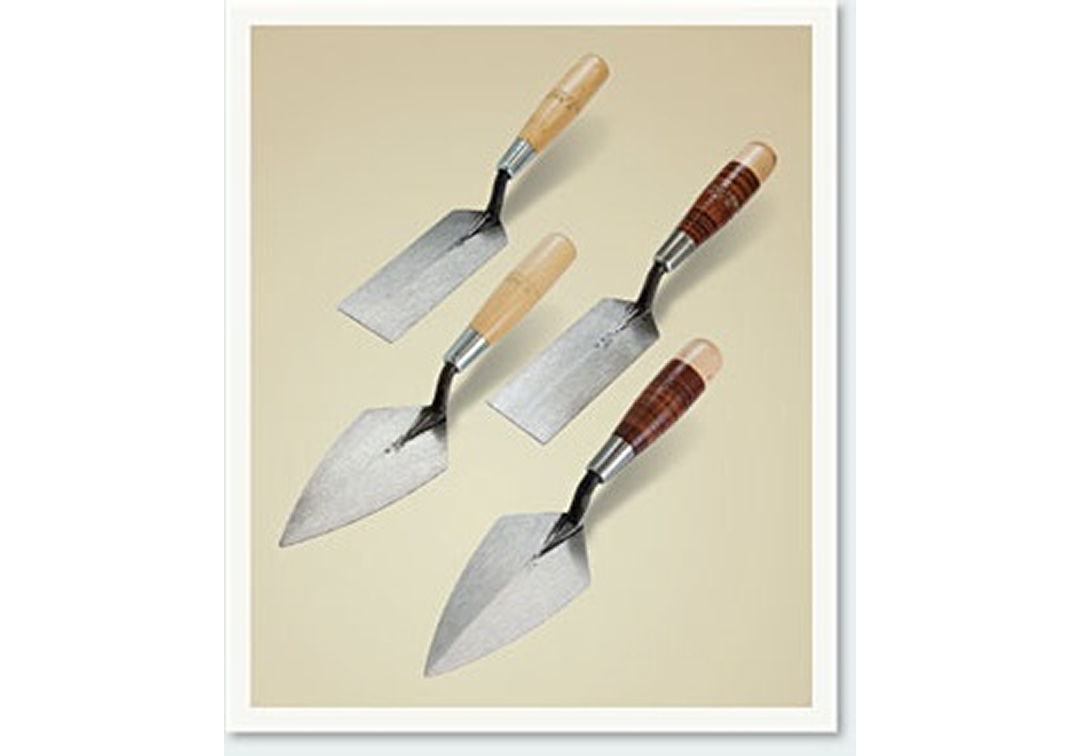 Set of four metal trowels