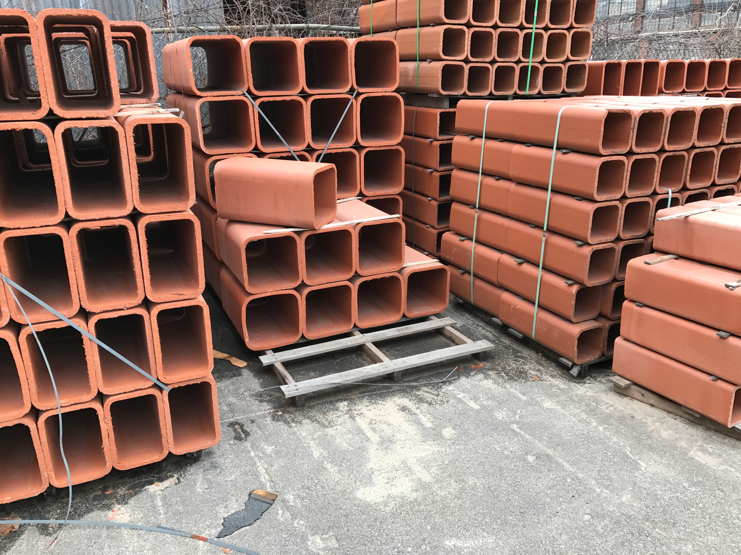 Terracotta pipes on pallets