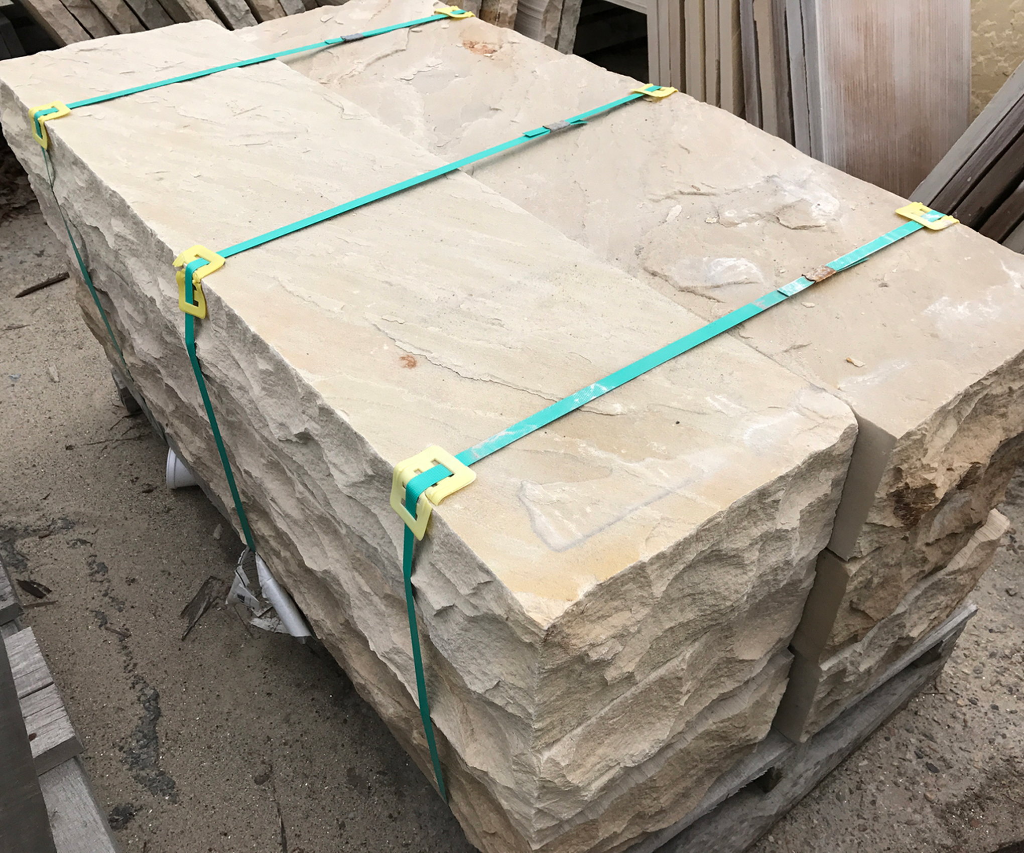 Rough-cut stones secured for transport