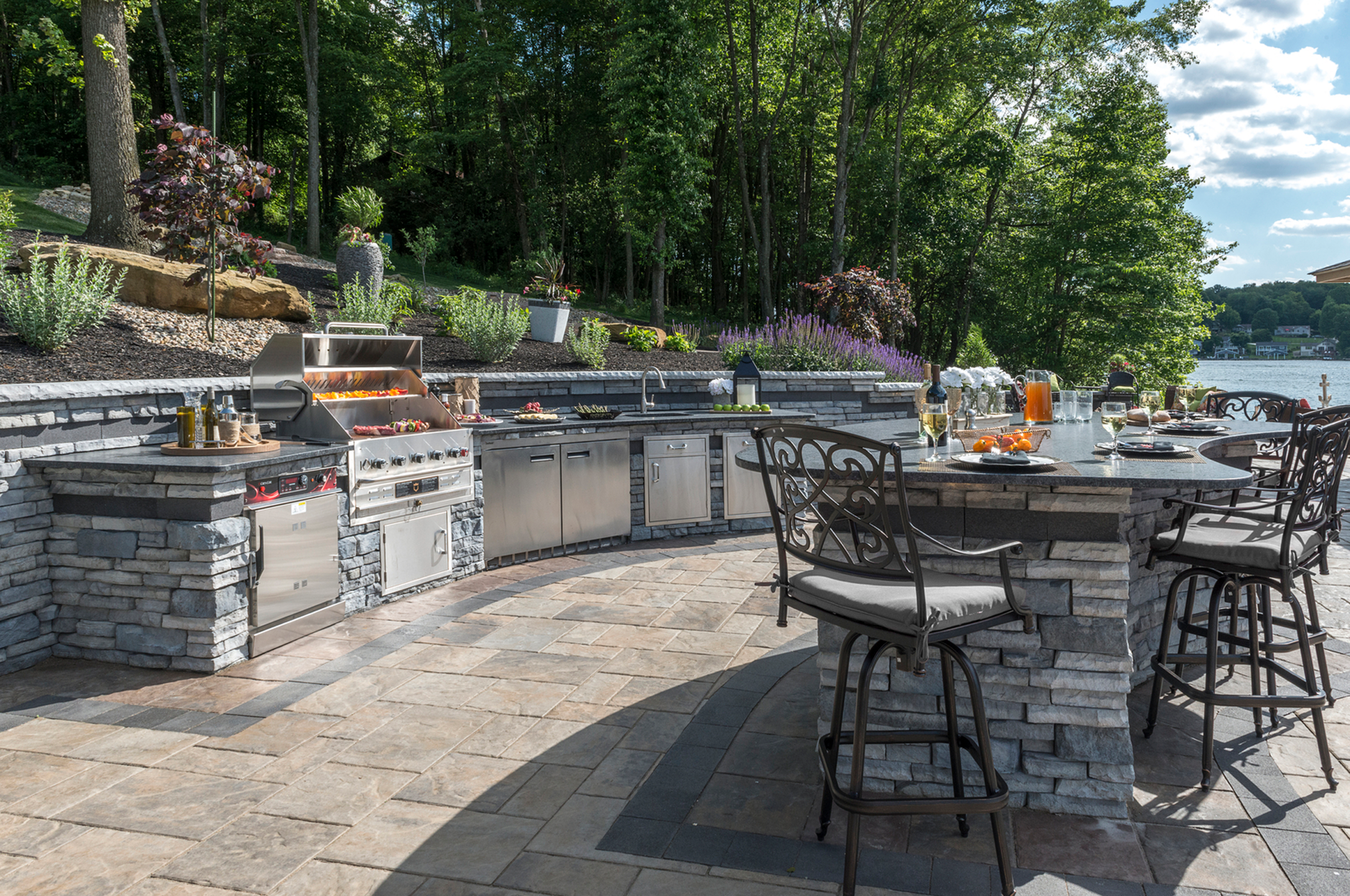 Elegant outdoor dining area with grill