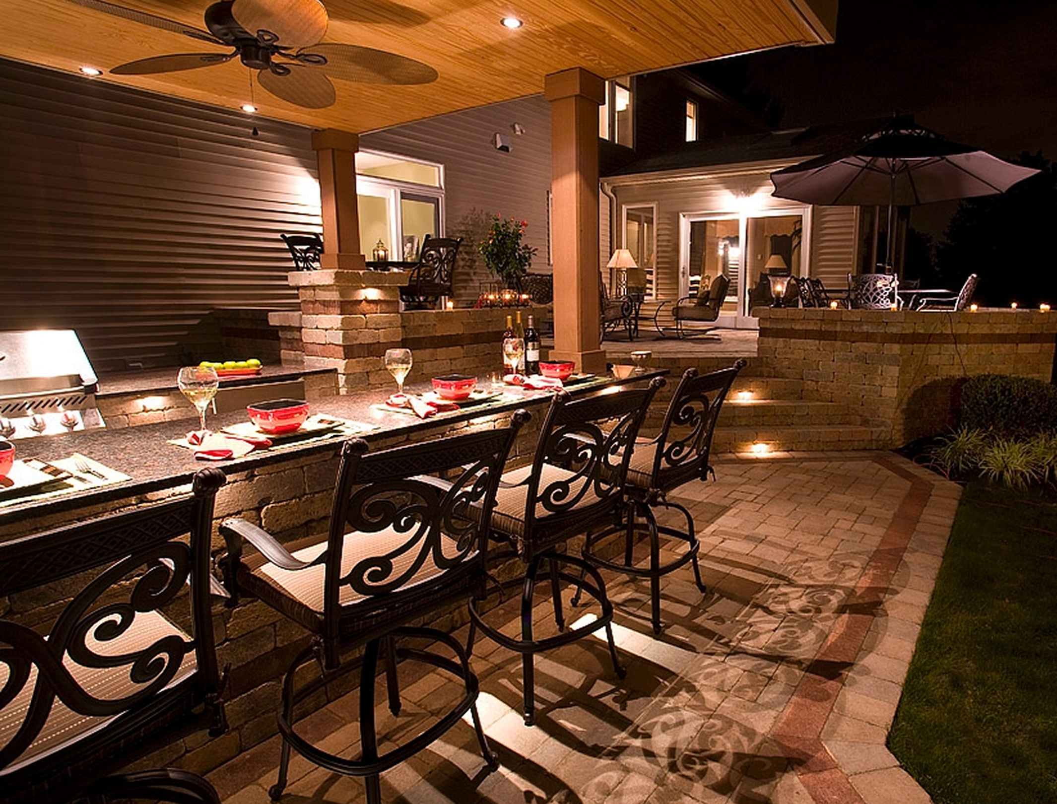 Outdoor patio dining area at night