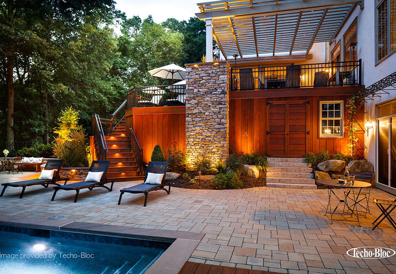 Evening garden view with lighting and seating