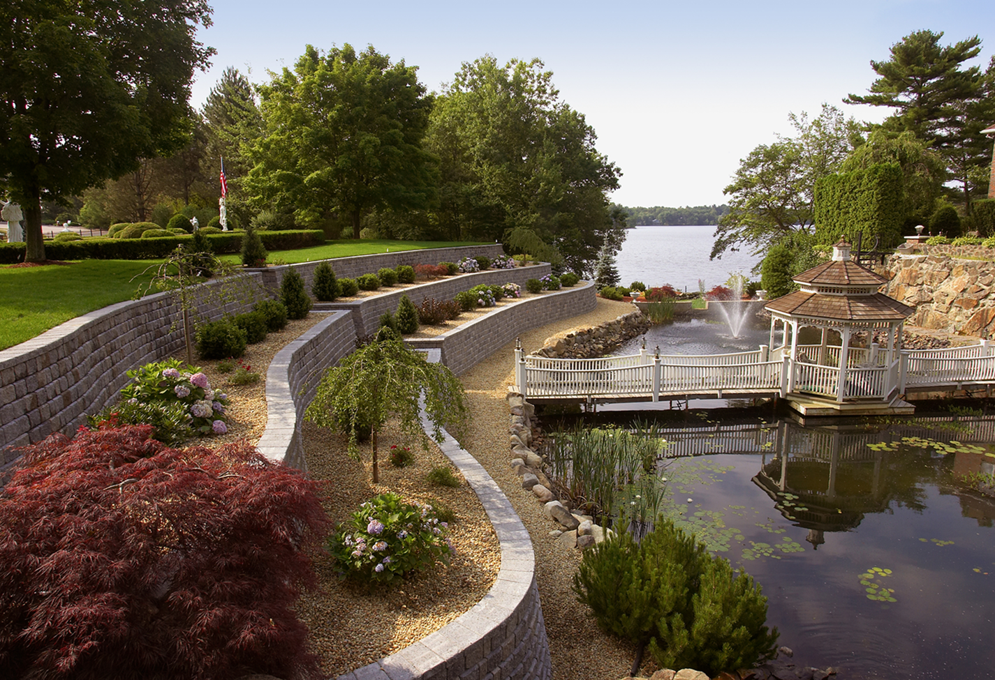 Gazebo beside tranquil water and fountain