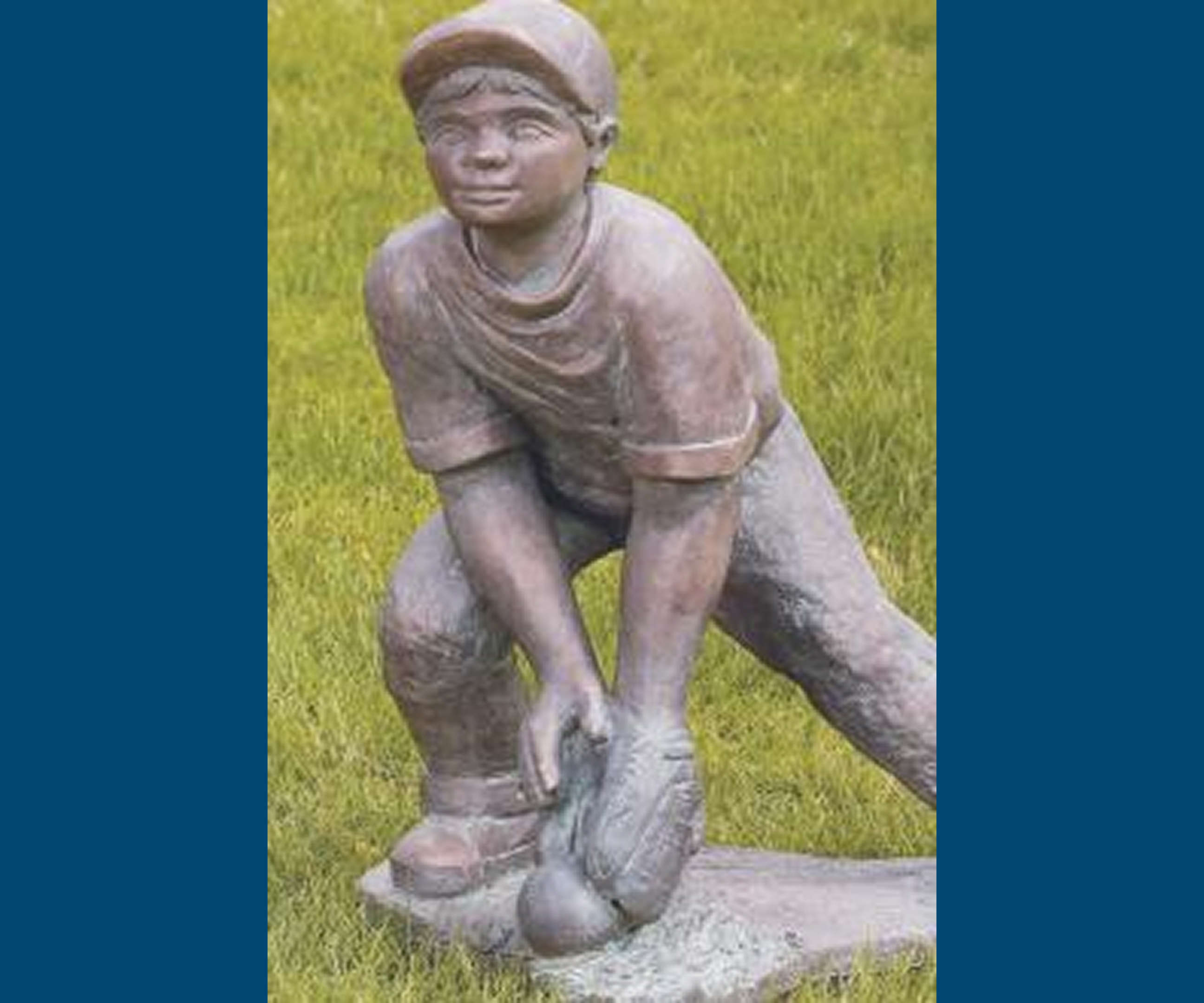 Bronze statue of a baseball player
