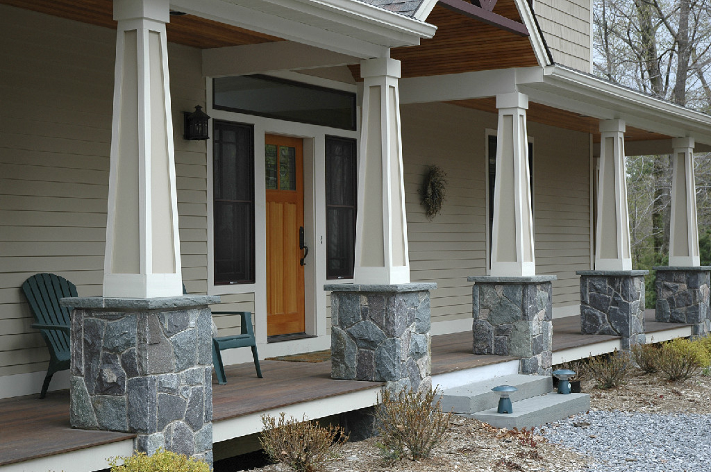 Wooden door and porch chairs
