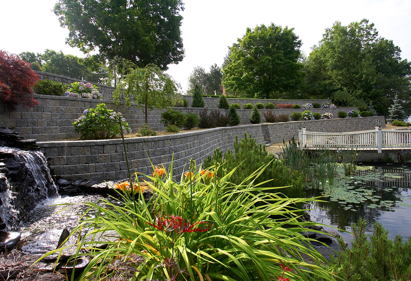 Stone walls in lush landscaped garden
