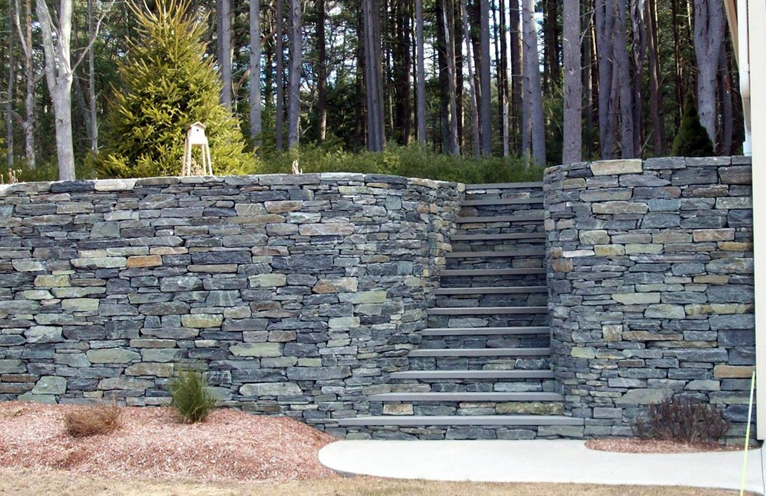 Stone staircase in garden wall