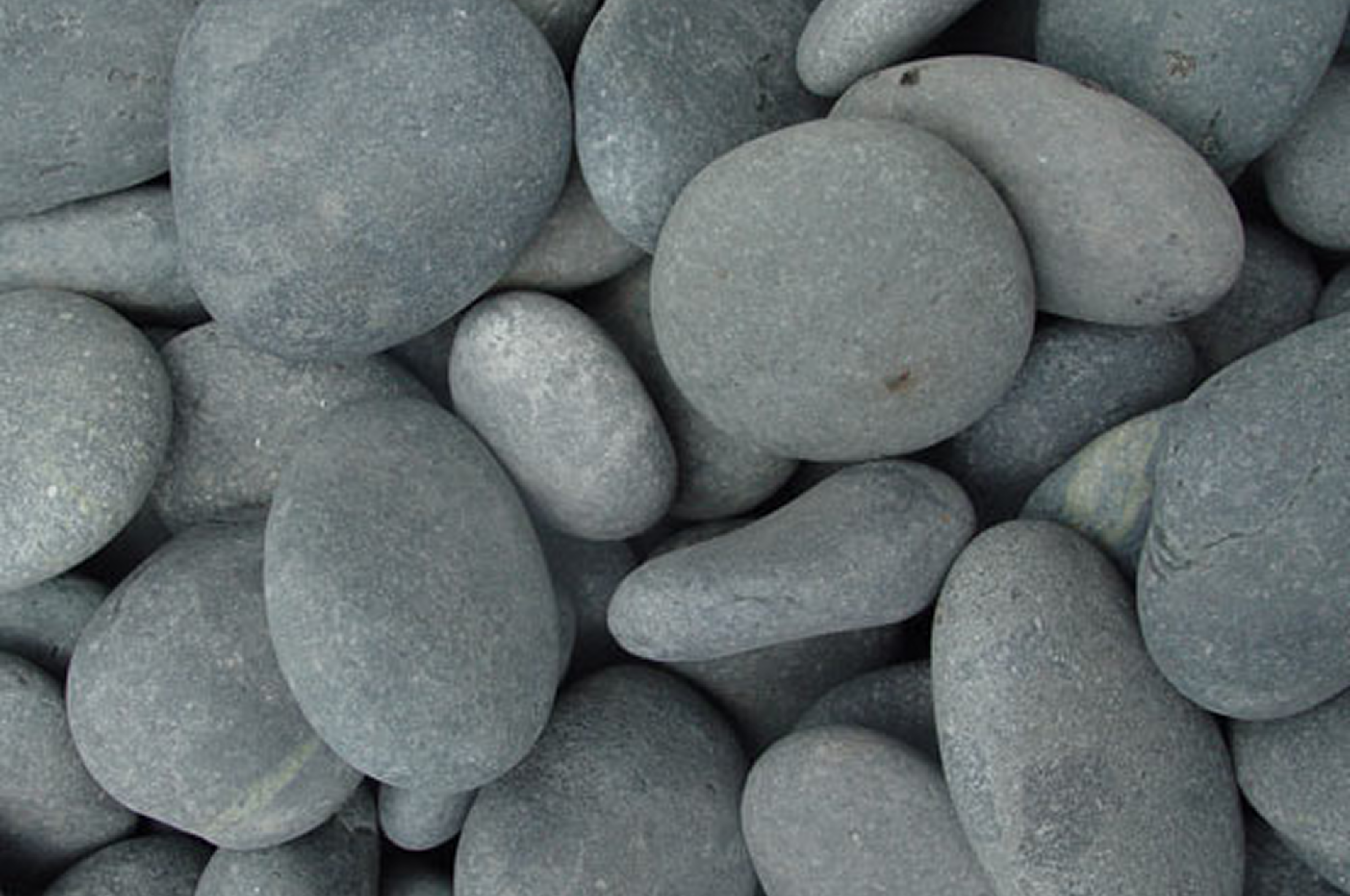Smooth gray pebbles close-up