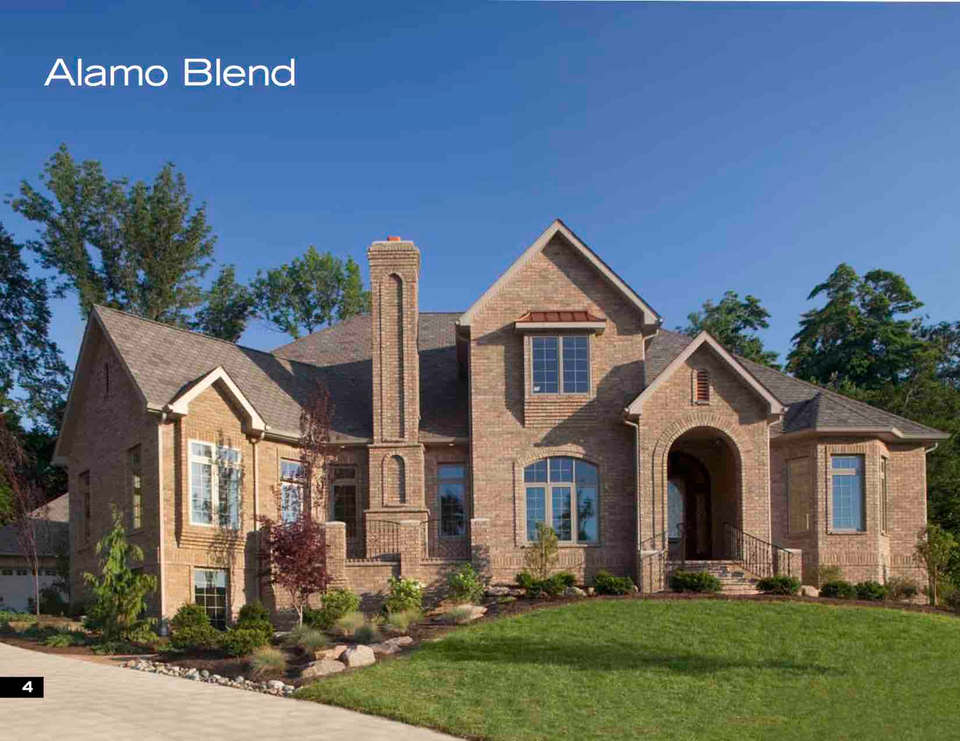 Brick house with landscaped garden