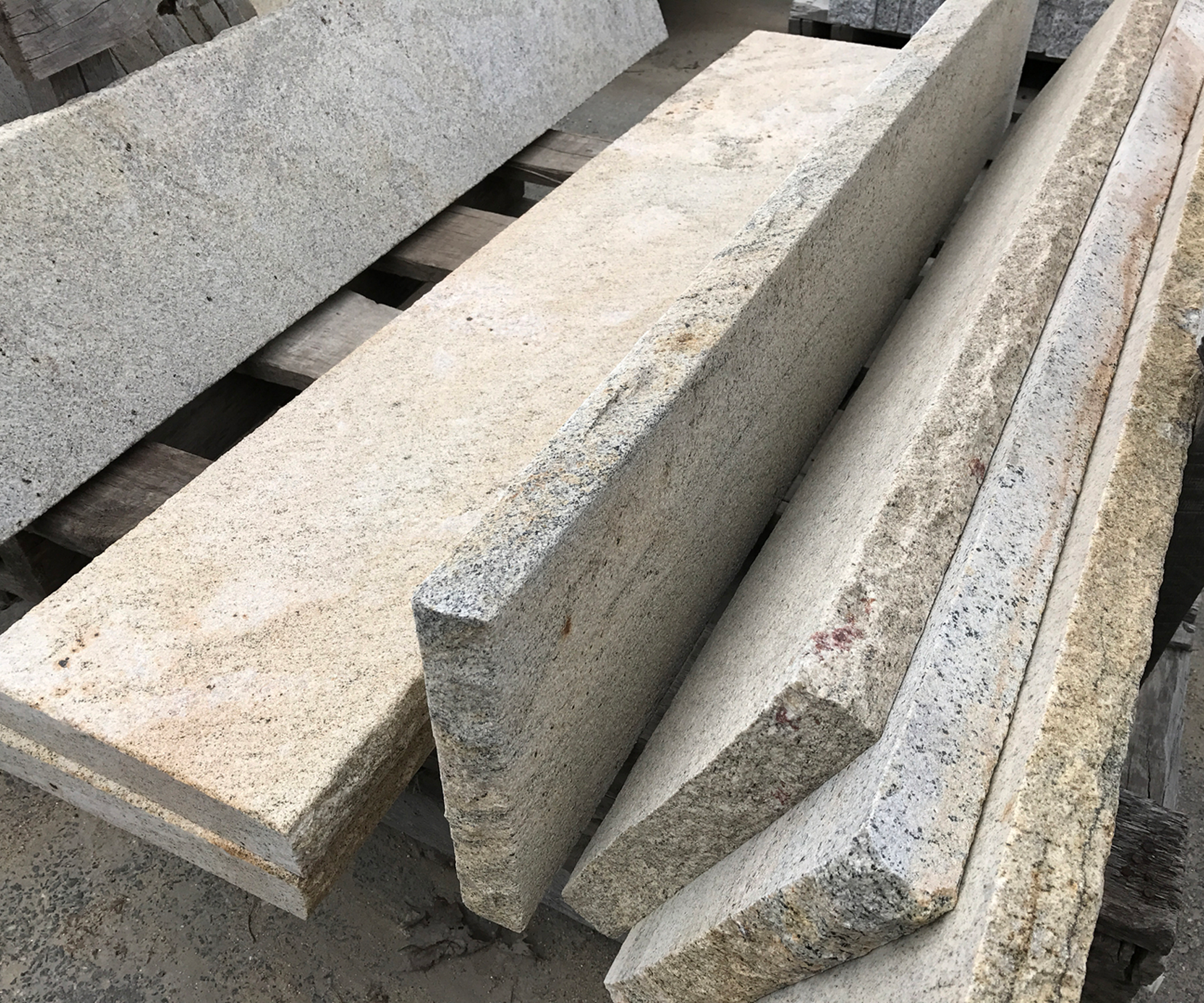 Stone slabs stacked on wooden pallets