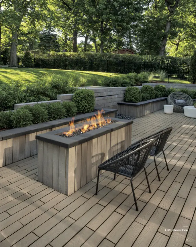 Outdoor wooden deck patio with fire pit