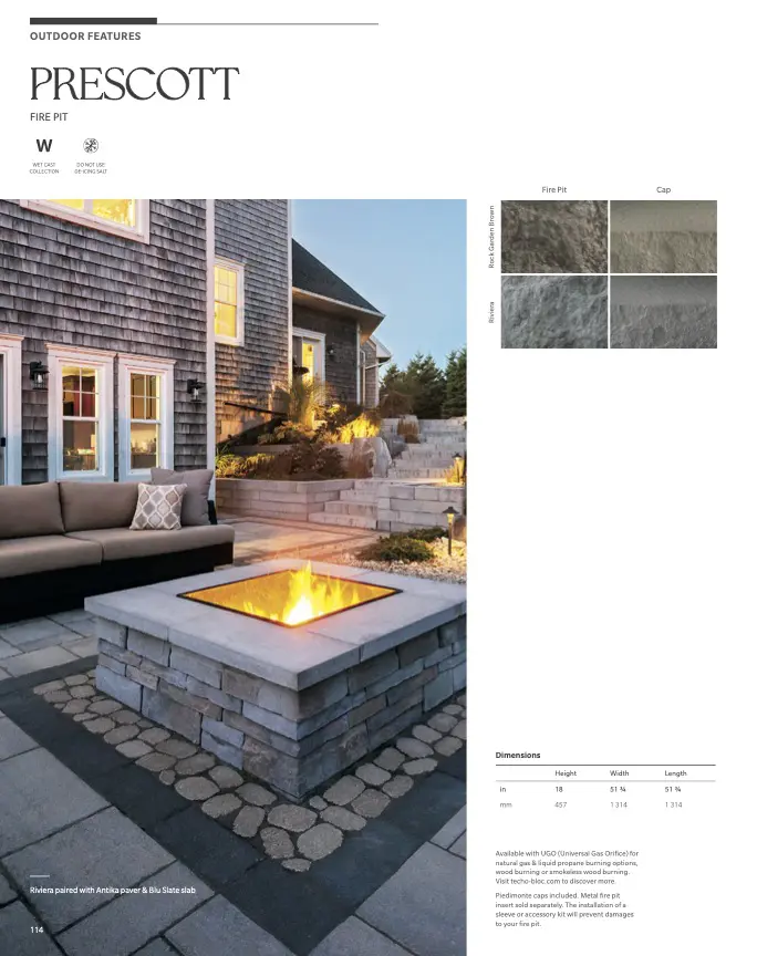Lit modern stone fire pit on patio