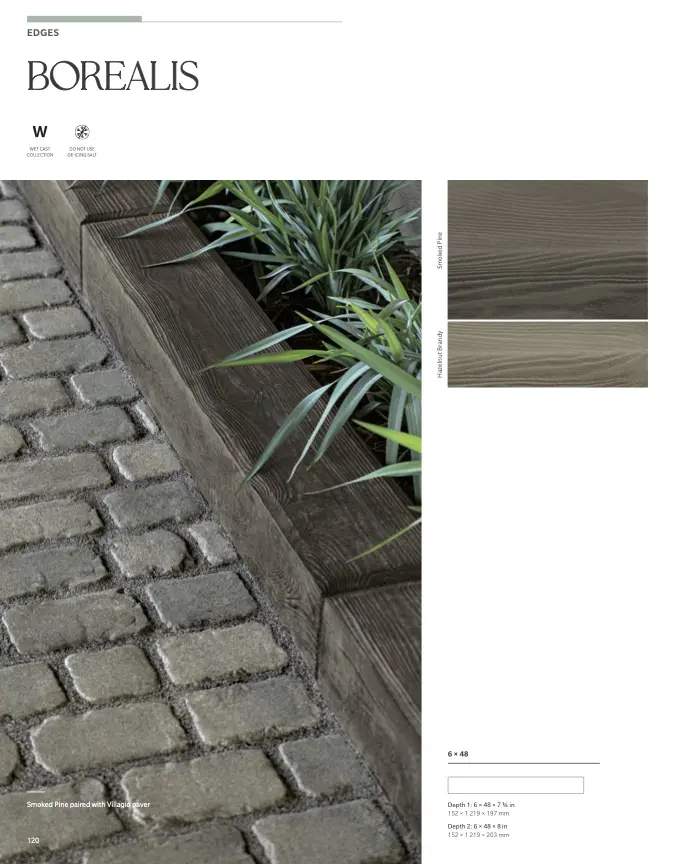 Wood-look planter edging beside cobblestone pathway