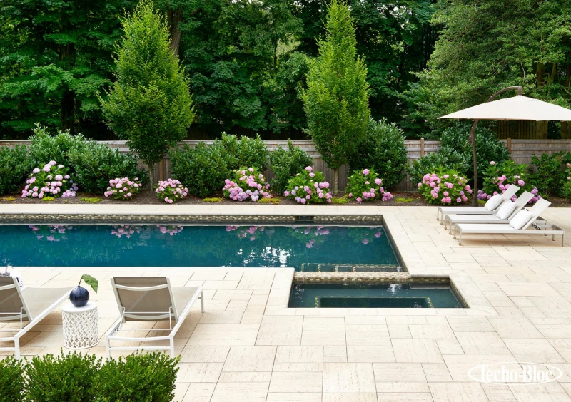 Elegant poolside with blooming flowers