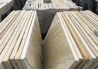 Beige stone slabs lined up neatly