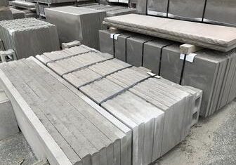 Piles of grey concrete blocks