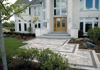 Elegant mansion entrance and landscaping