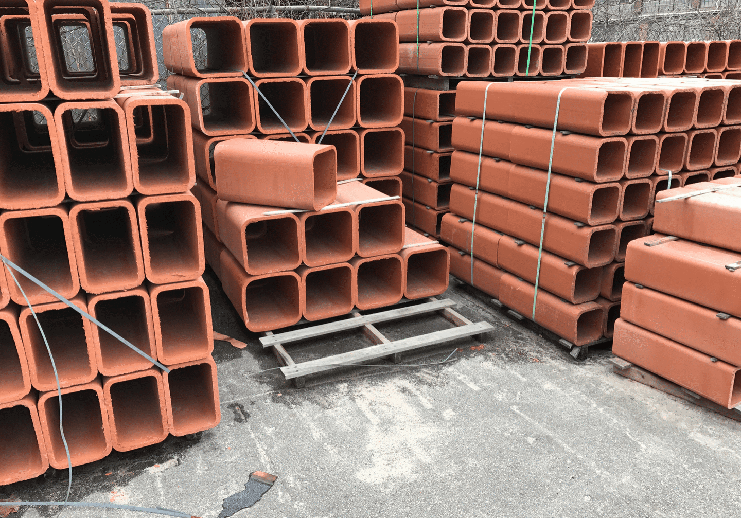Terracotta pipes on pallets